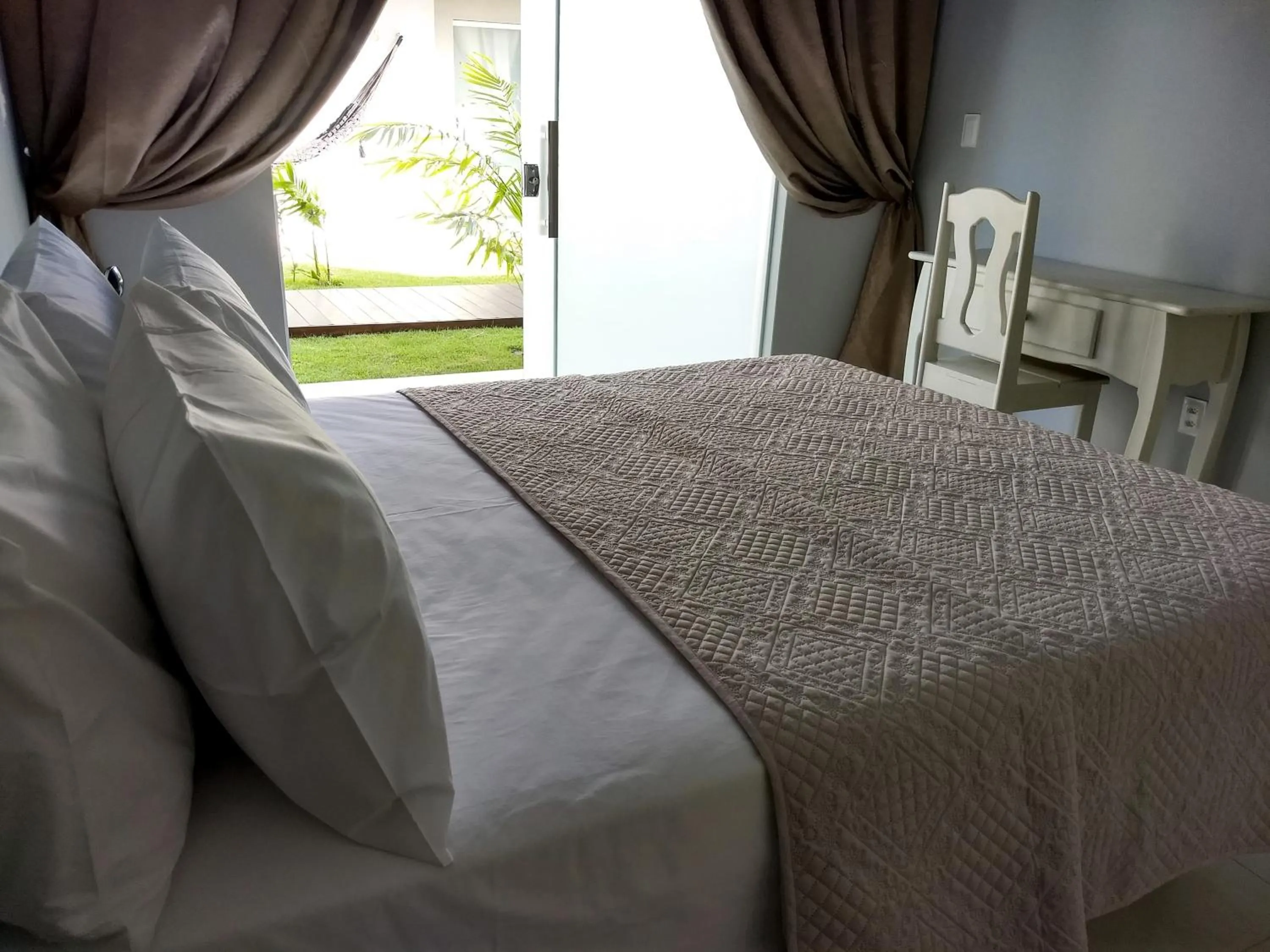 Bed in Relais de Charme Boutique Hotel Pititinga