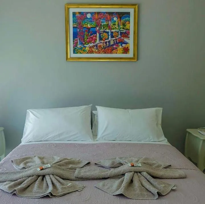 Bed in Relais de Charme Boutique Hotel Pititinga