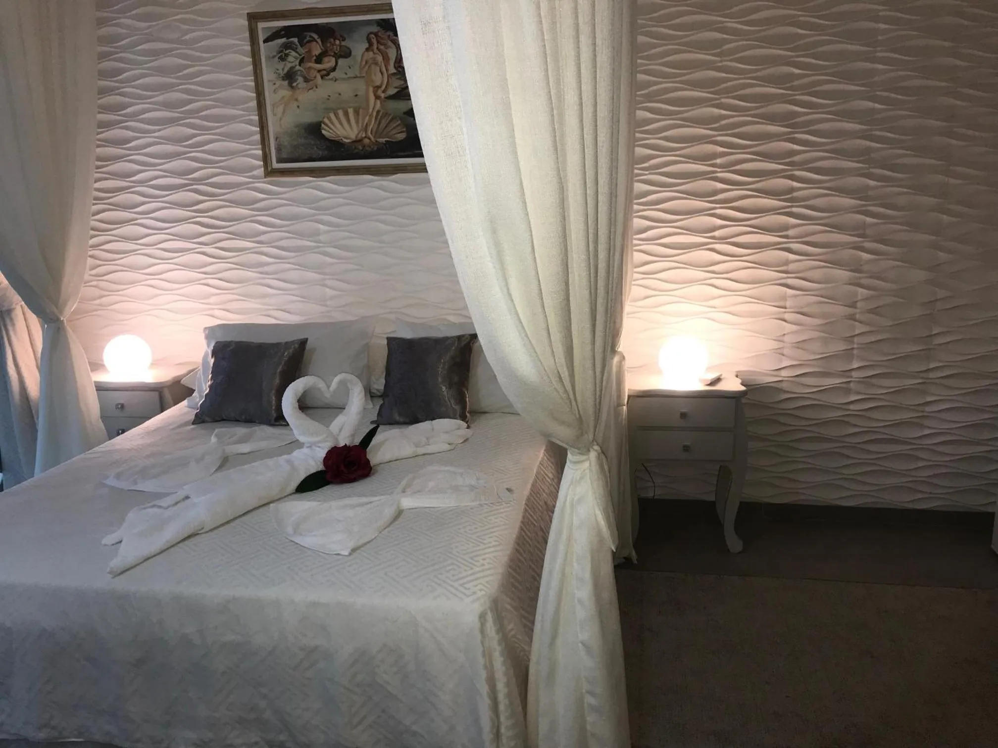 Bed in Relais de Charme Boutique Hotel Pititinga