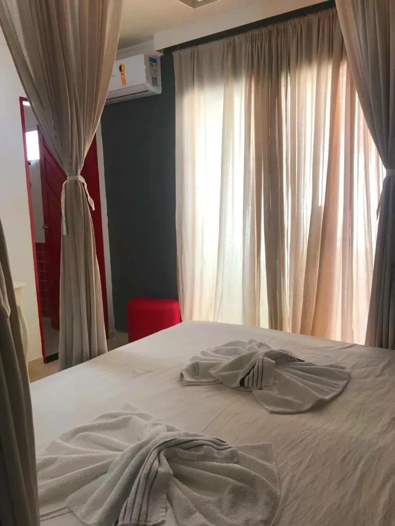 Bed in Relais de Charme Boutique Hotel Pititinga