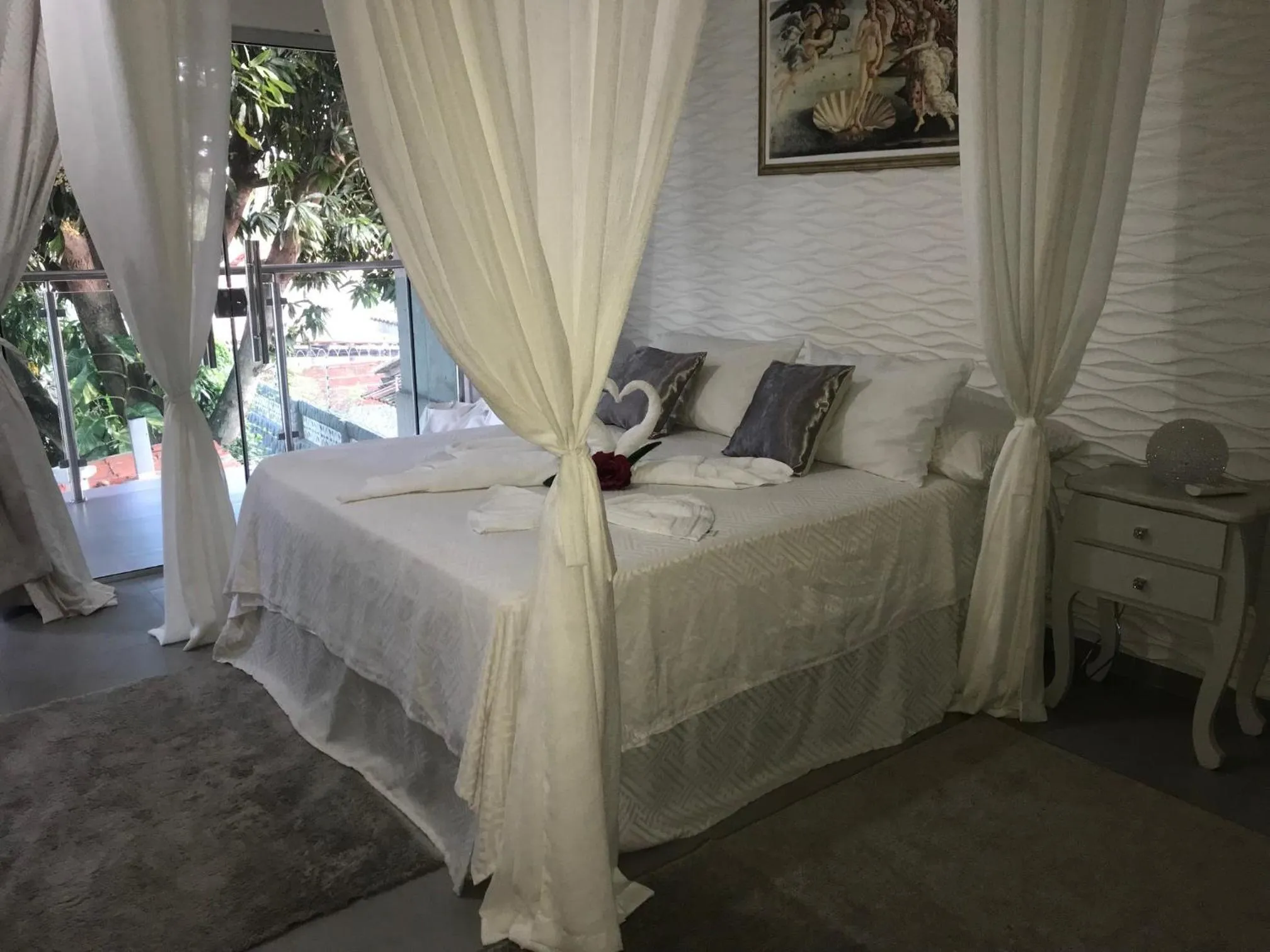 Bed in Relais de Charme Boutique Hotel Pititinga