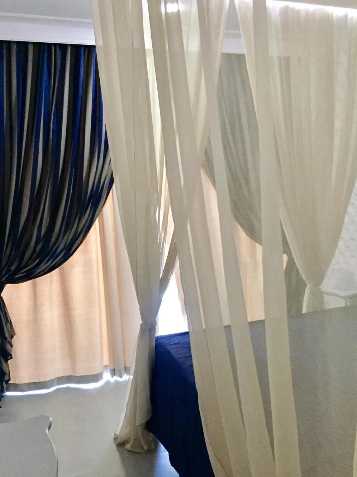 Bed in Relais de Charme Boutique Hotel Pititinga