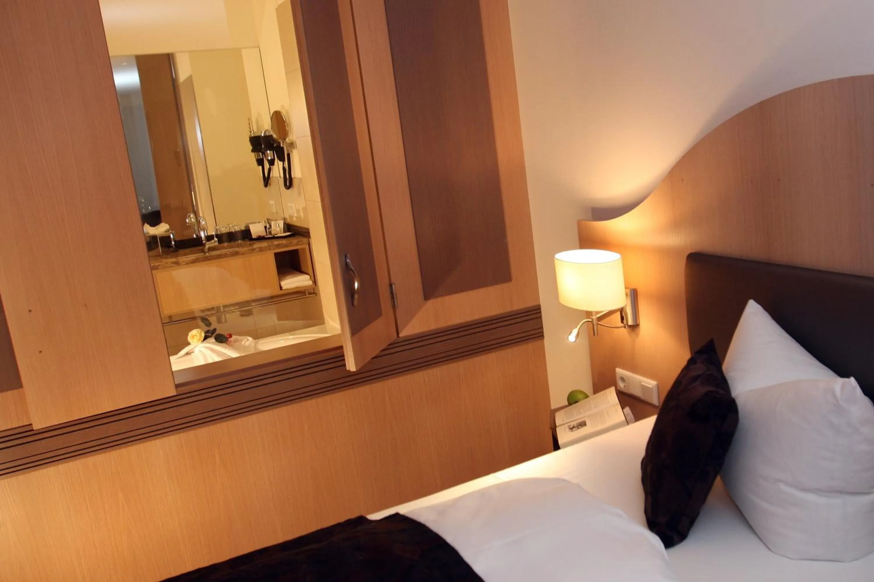 Bed in Villa Ludwig Suite Hotel