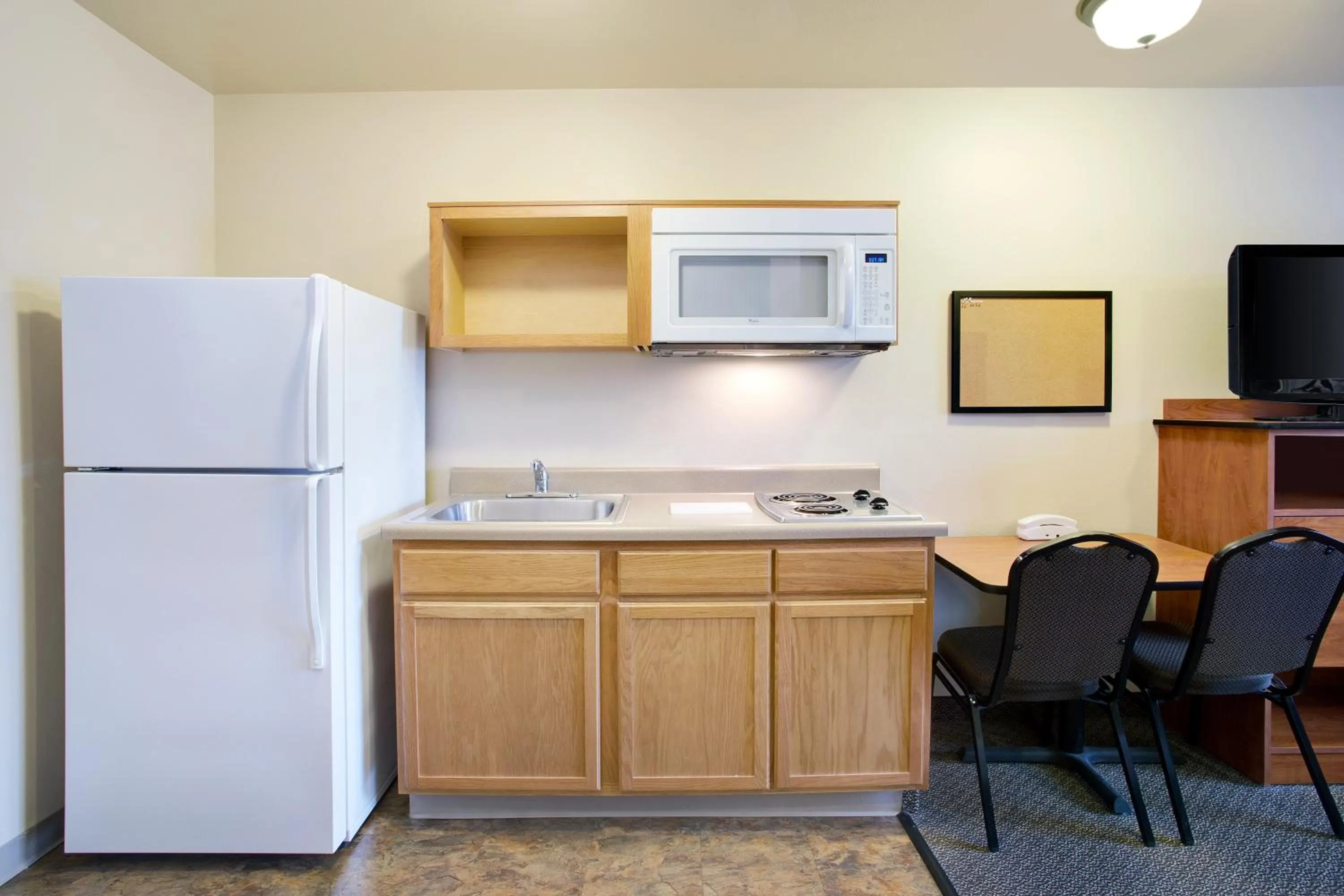 Kitchen or kitchenette in WoodSpring Suites Raleigh Northeast Wake Forest