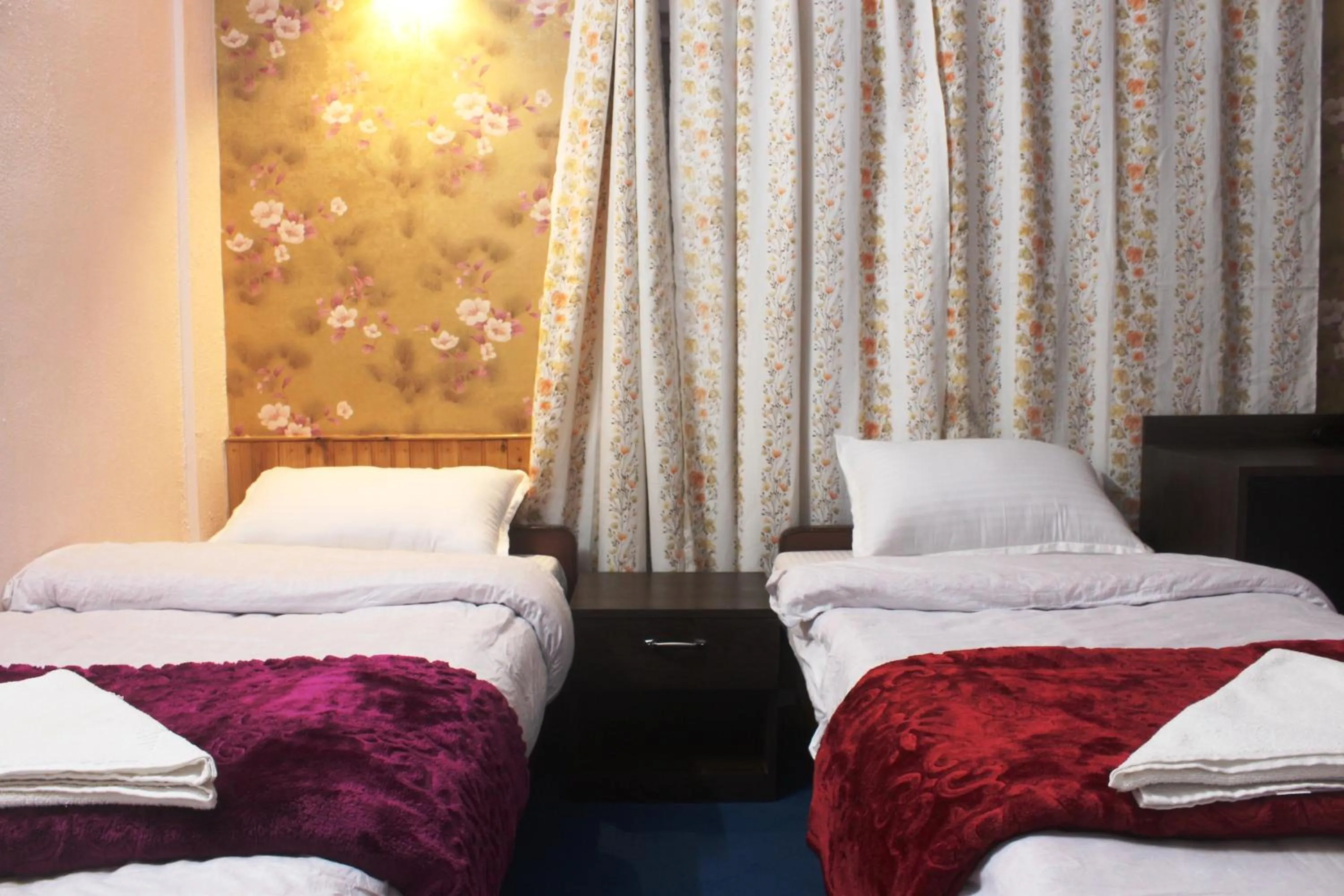 Bed in Hotel Paradiso