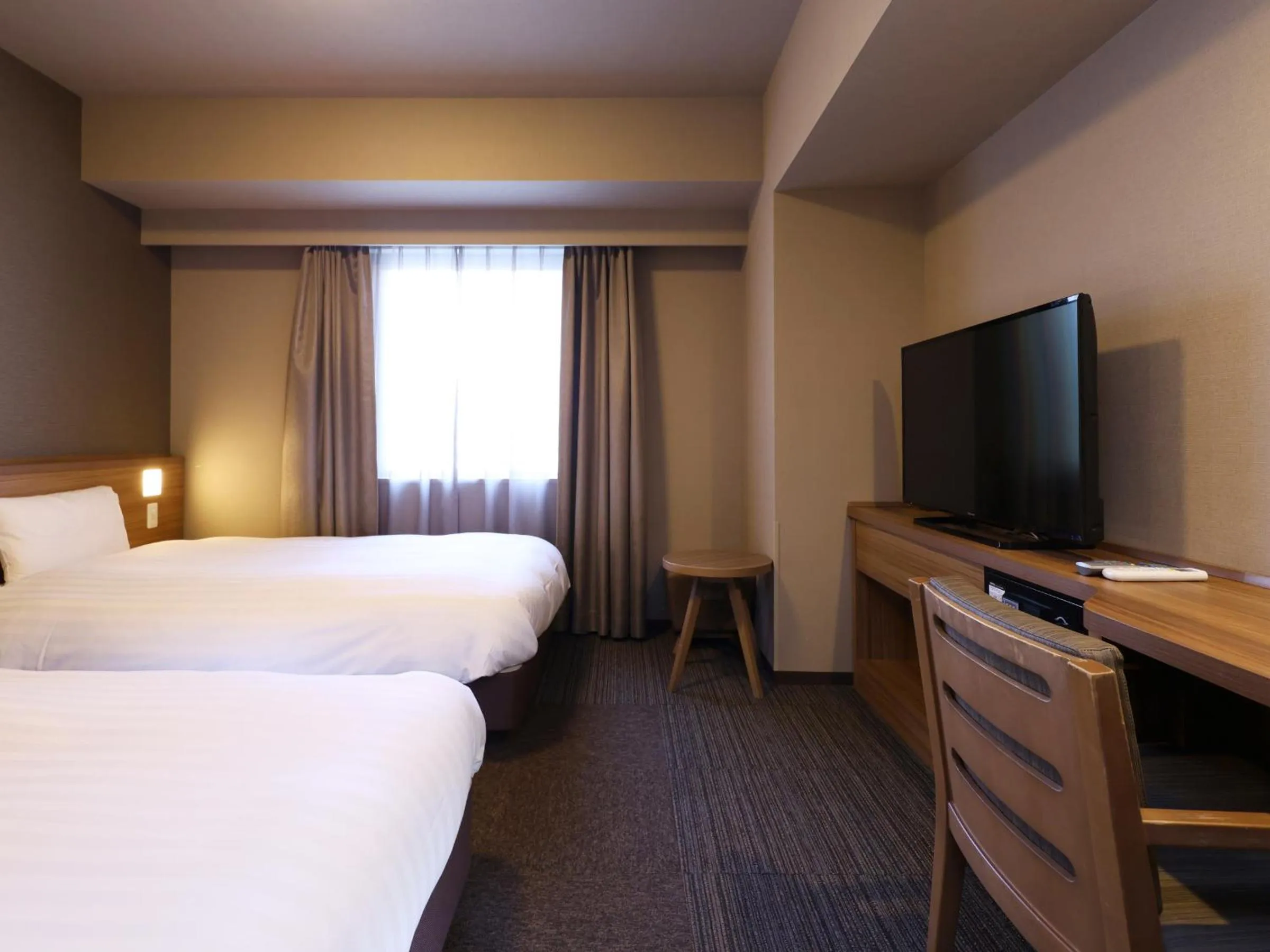 Bed in Dormy Inn Premium Fukui Natural Hot Spring