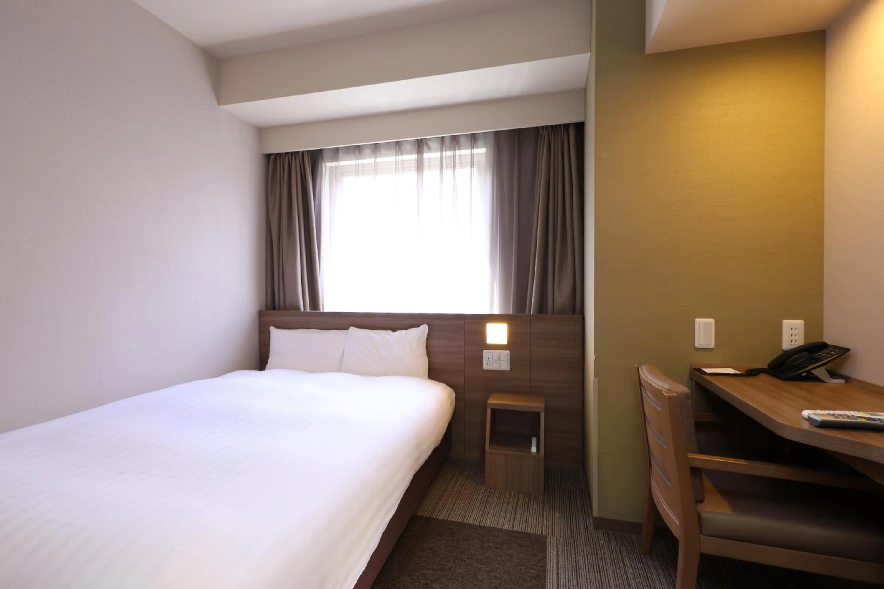 Bed in Dormy Inn Premium Fukui Natural Hot Spring