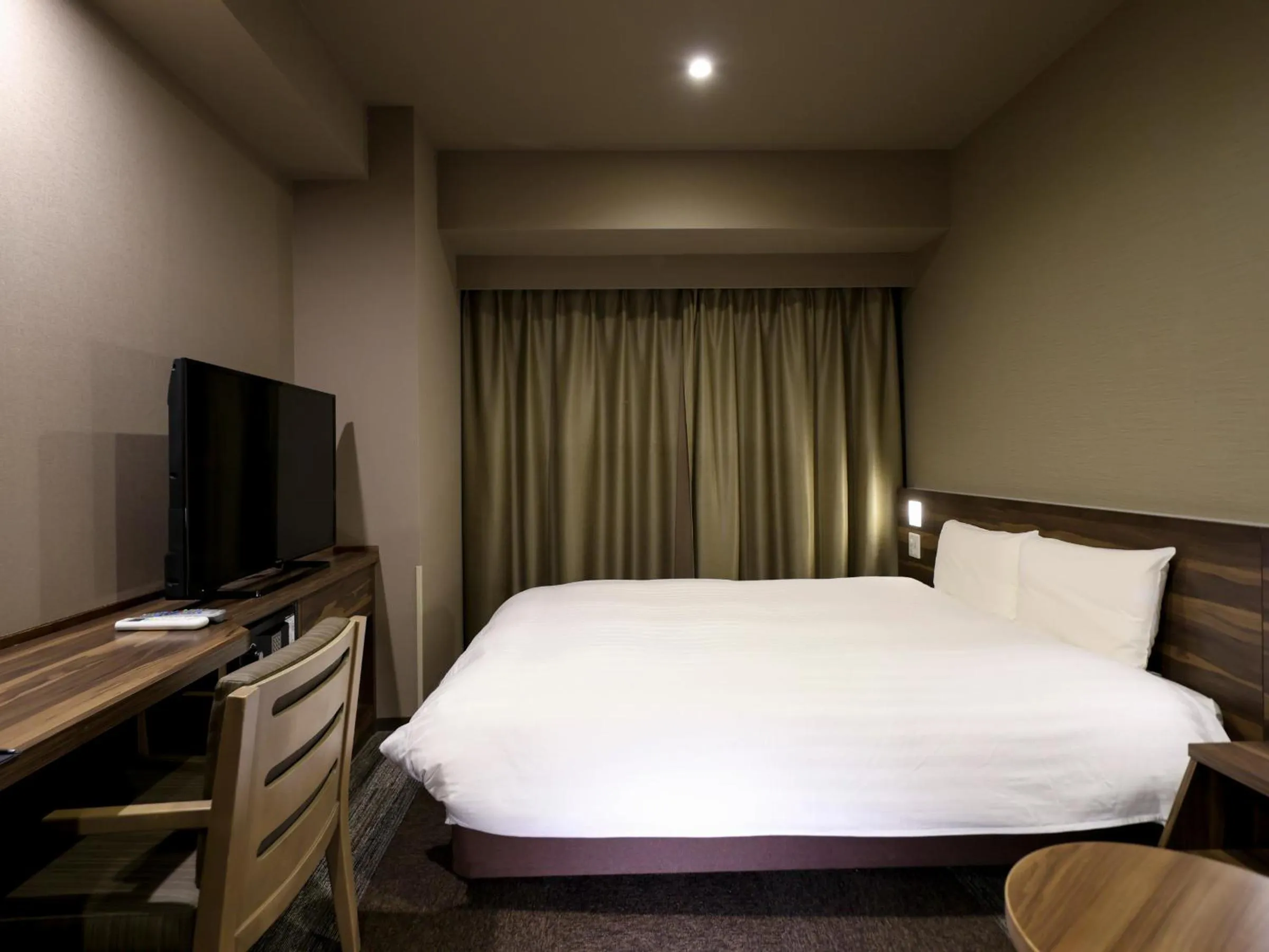 Bed in Dormy Inn Premium Fukui Natural Hot Spring