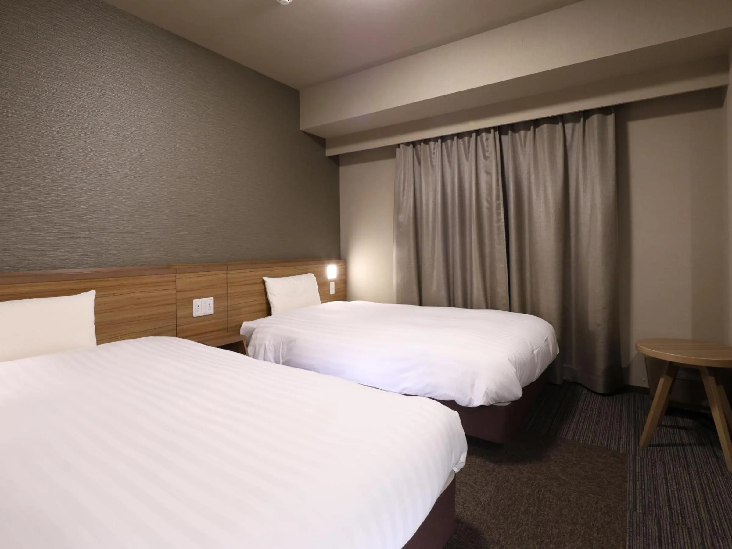 Bed in Dormy Inn Premium Fukui Natural Hot Spring