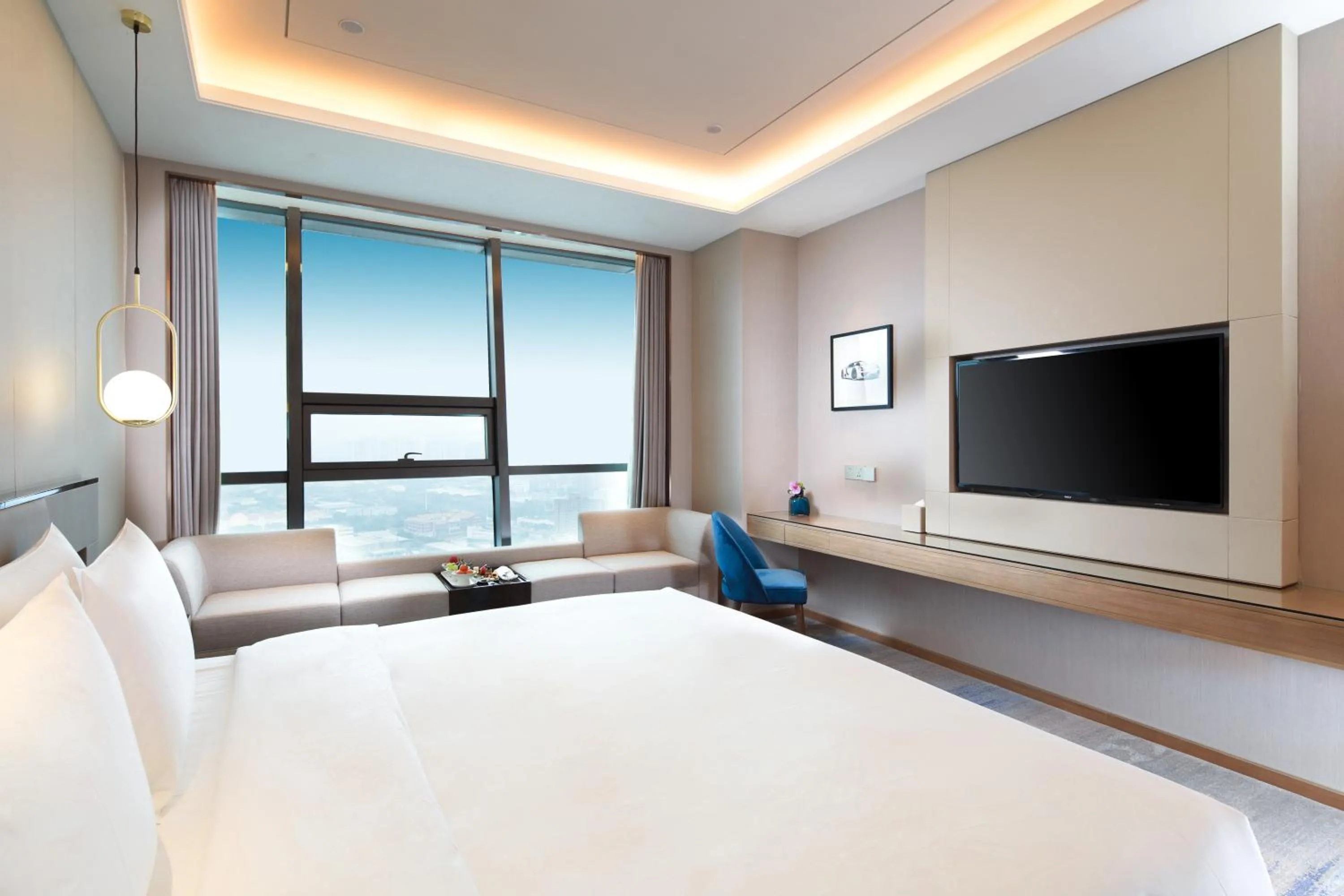 Bed in Auto City Ruili Hotel