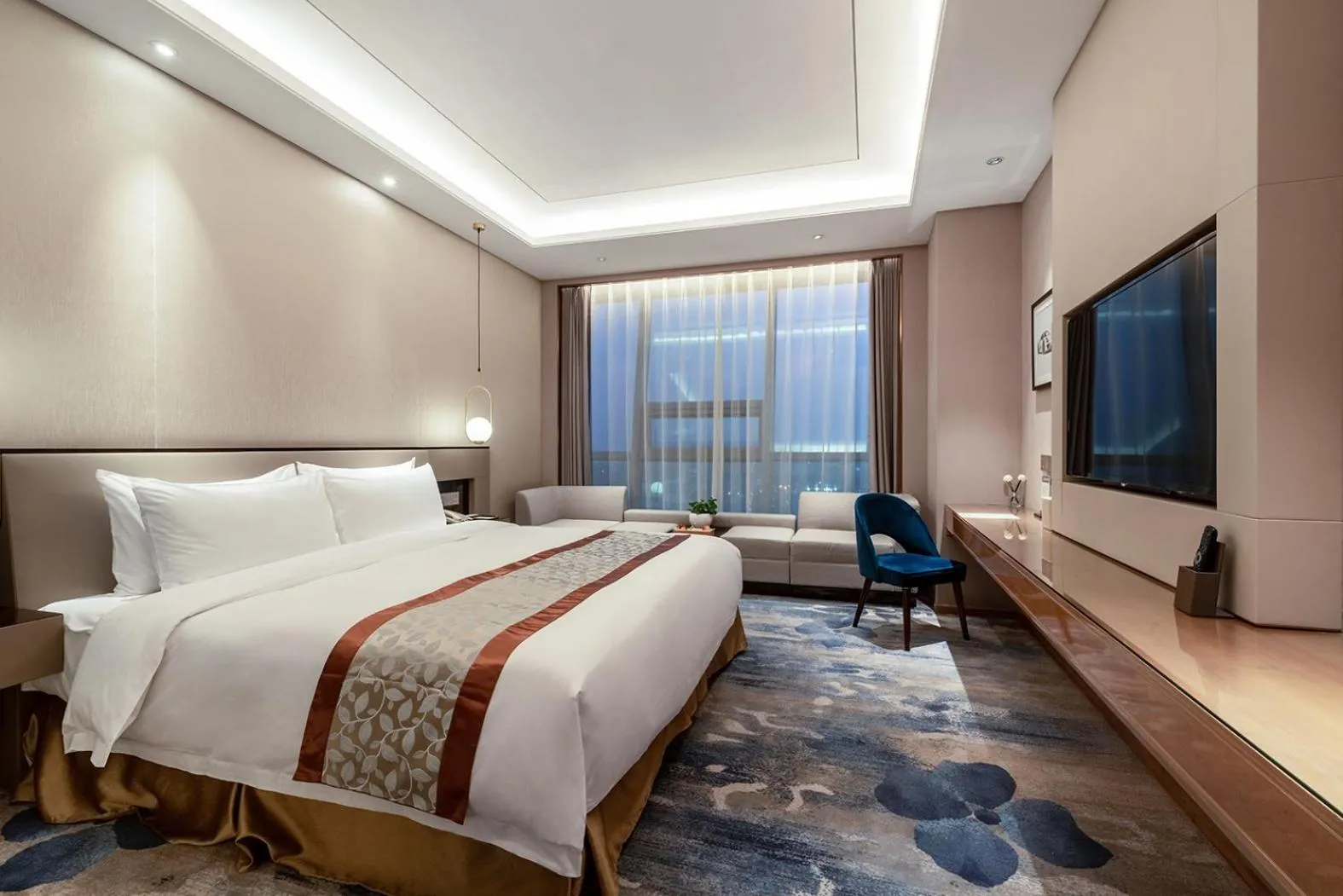 Bed in Auto City Ruili Hotel