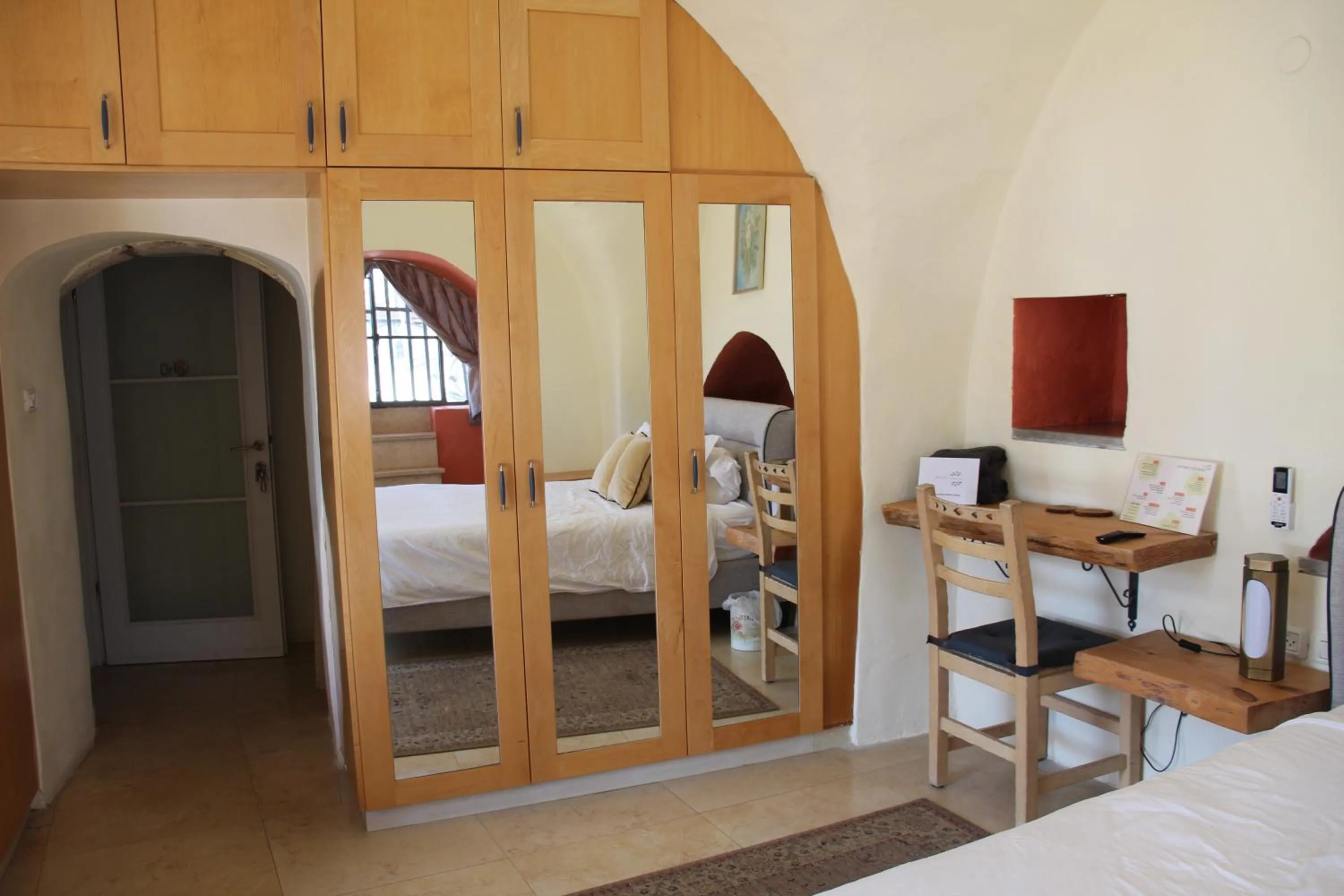 Seating area, Bed in Artists' Colony Inn Zefat