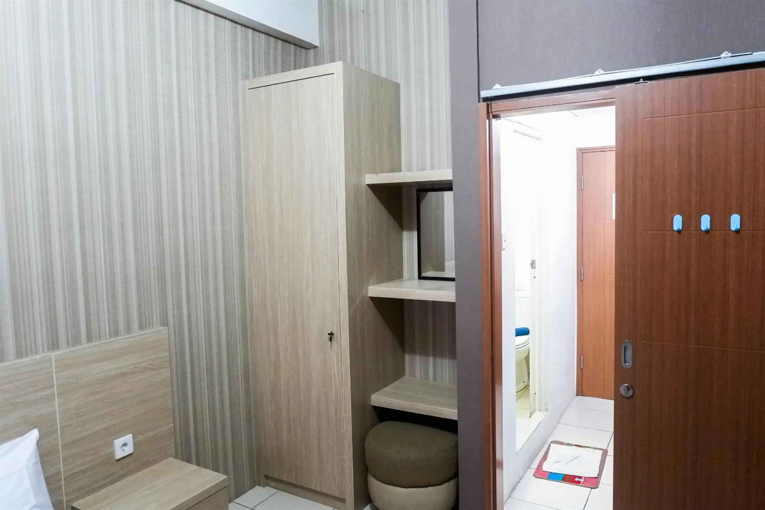 Bedroom, Bed in Modern Studio Apartment at Pavilion Permata 2 By Travelio