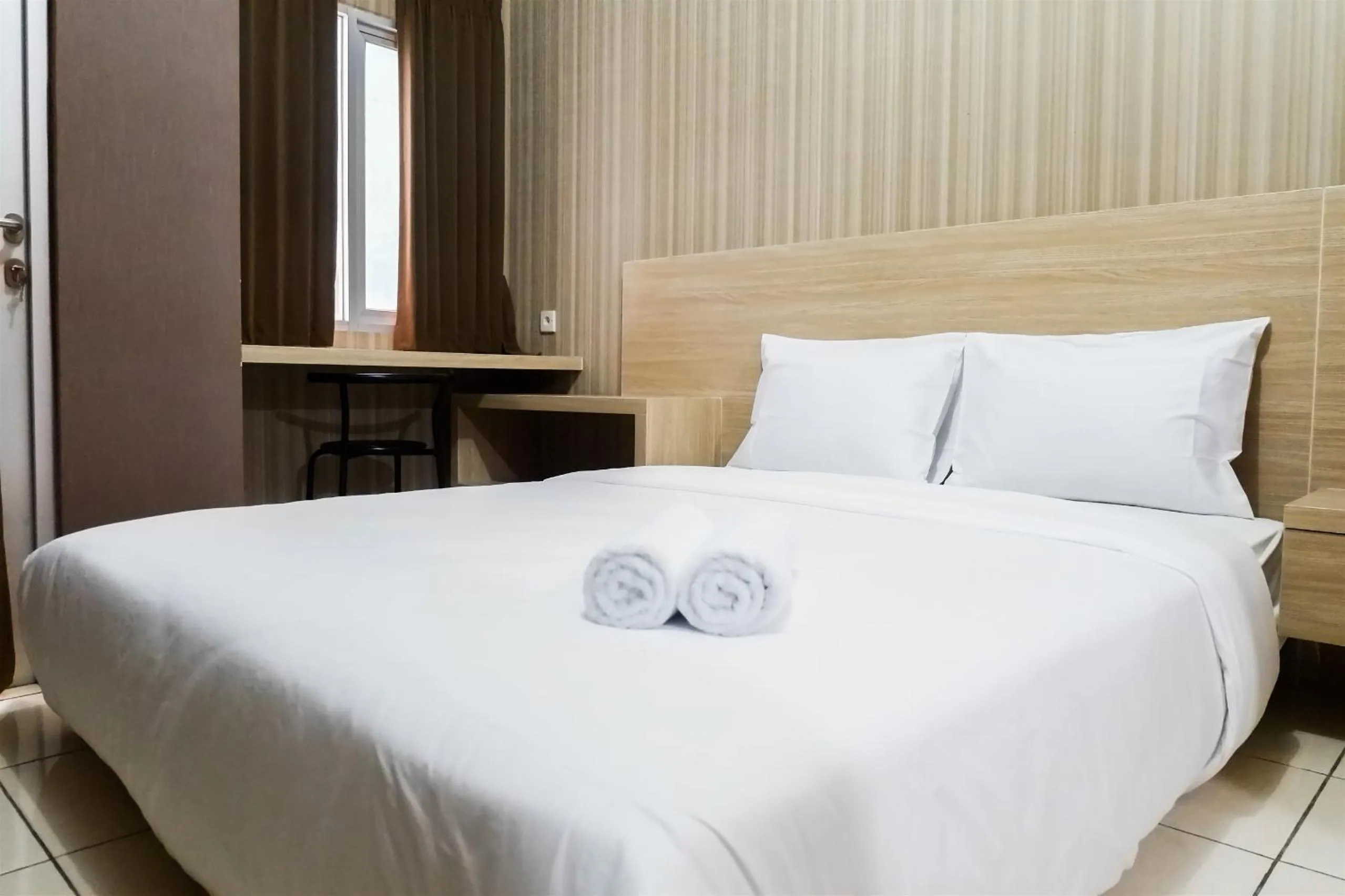 Bed in Modern Studio Apartment at Pavilion Permata 2 By Travelio