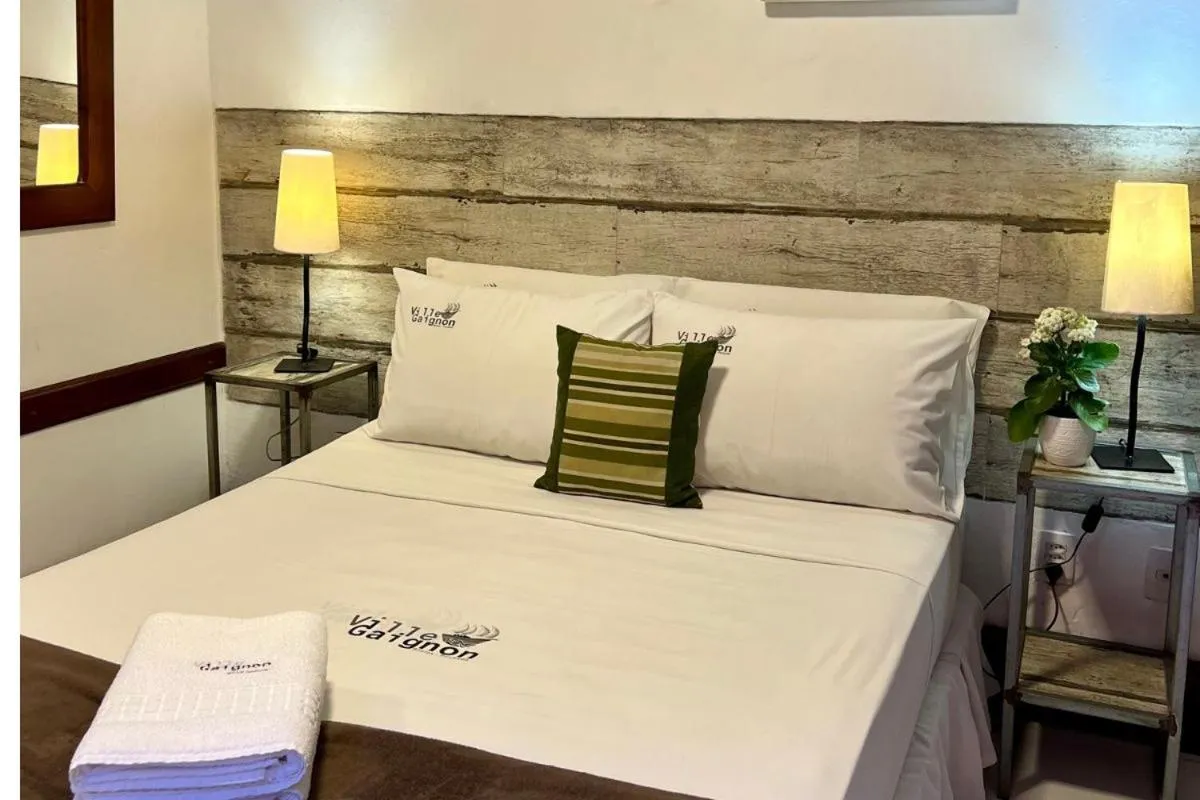 Bed in Pousada Villegaignon
