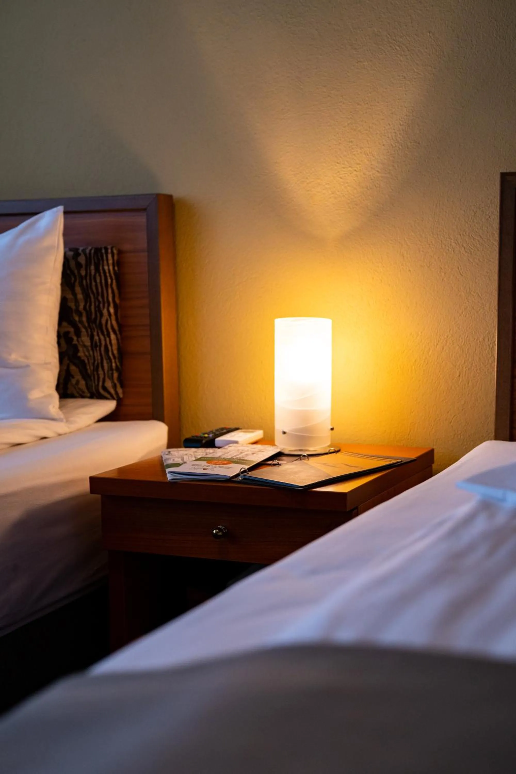 Bed in Areo Hotel & Restaurant