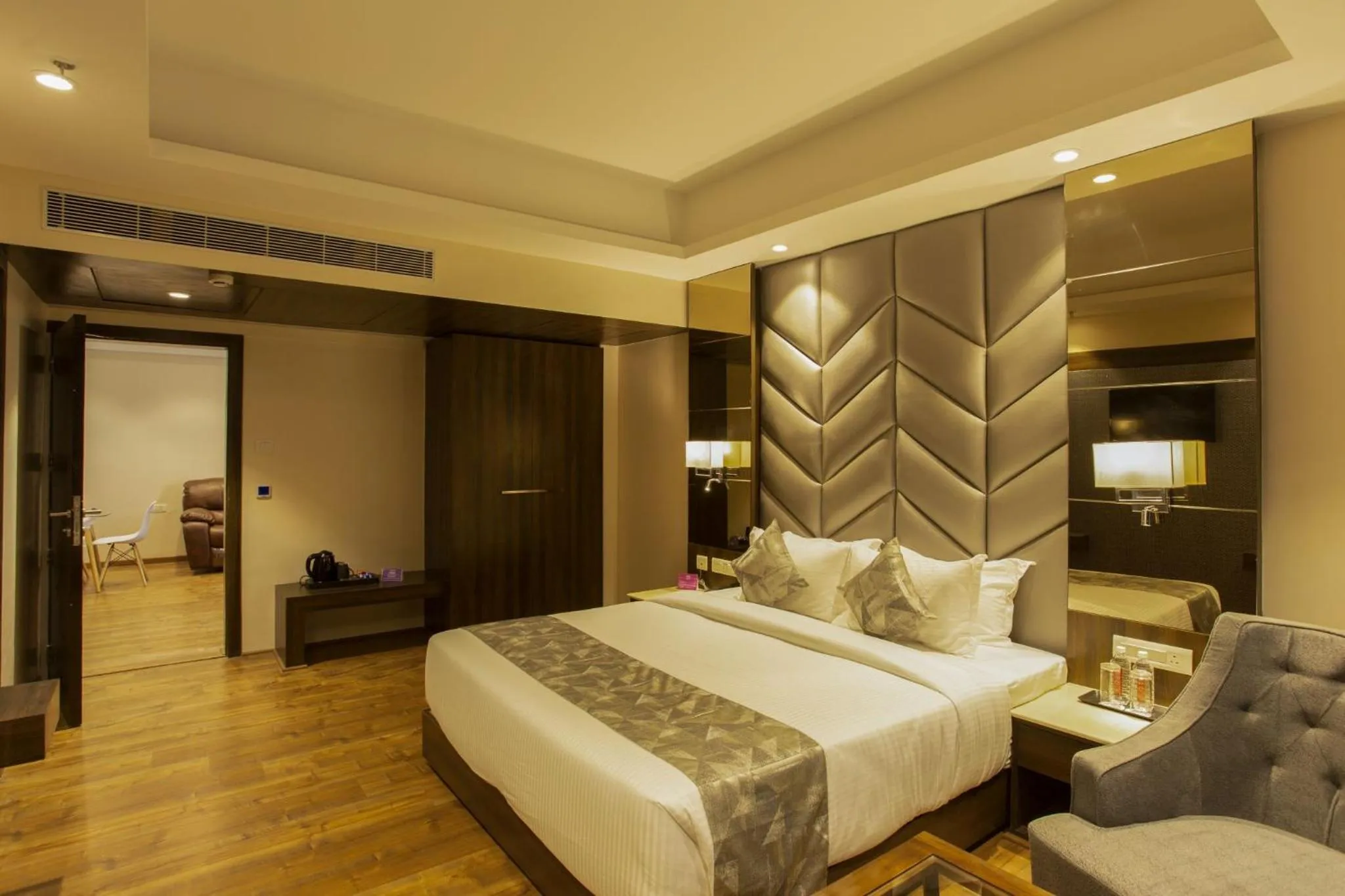 Photo of the whole room, Bed in Sarovar Portico, Somnath