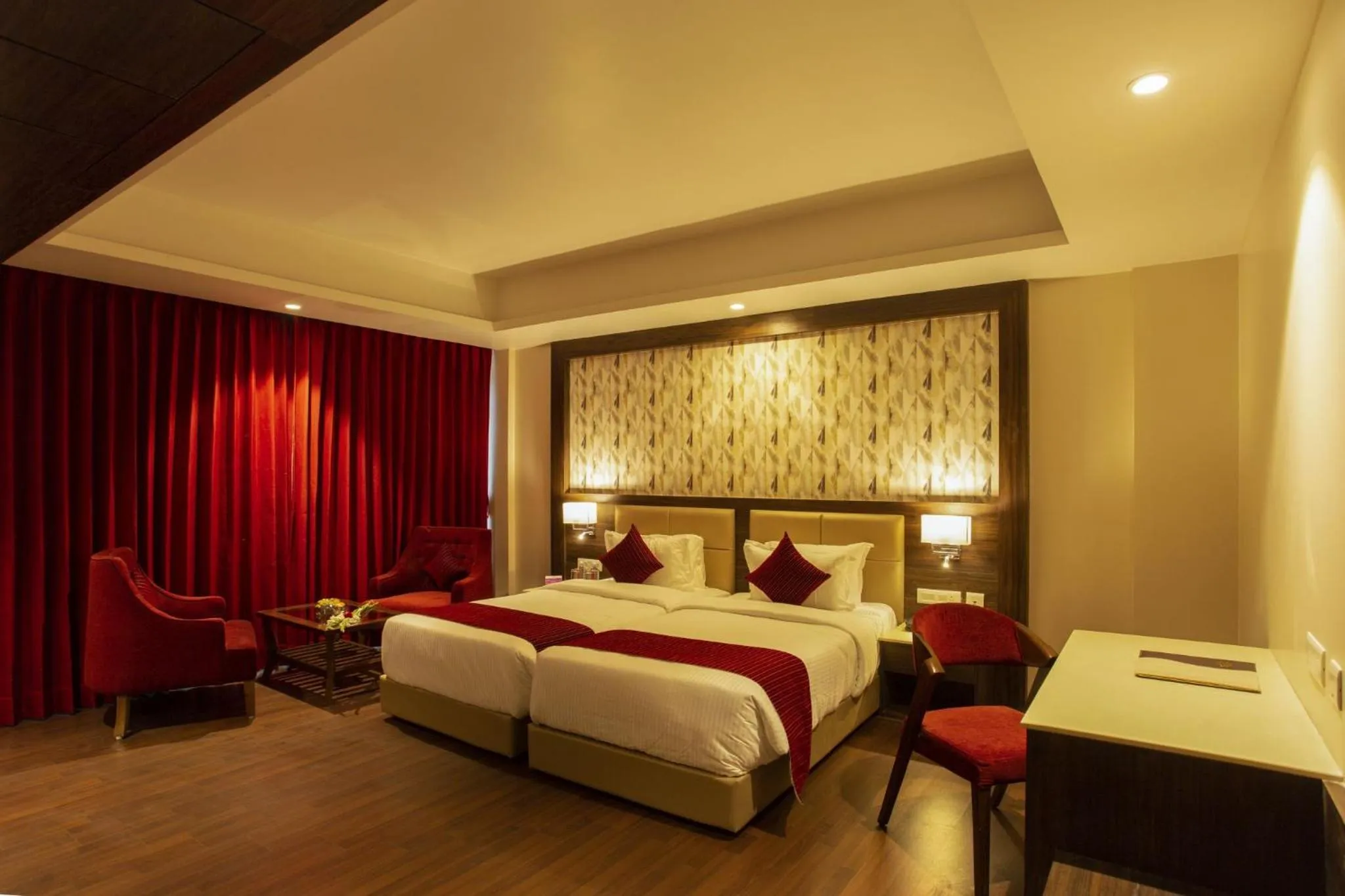 Photo of the whole room, Bed in Sarovar Portico, Somnath