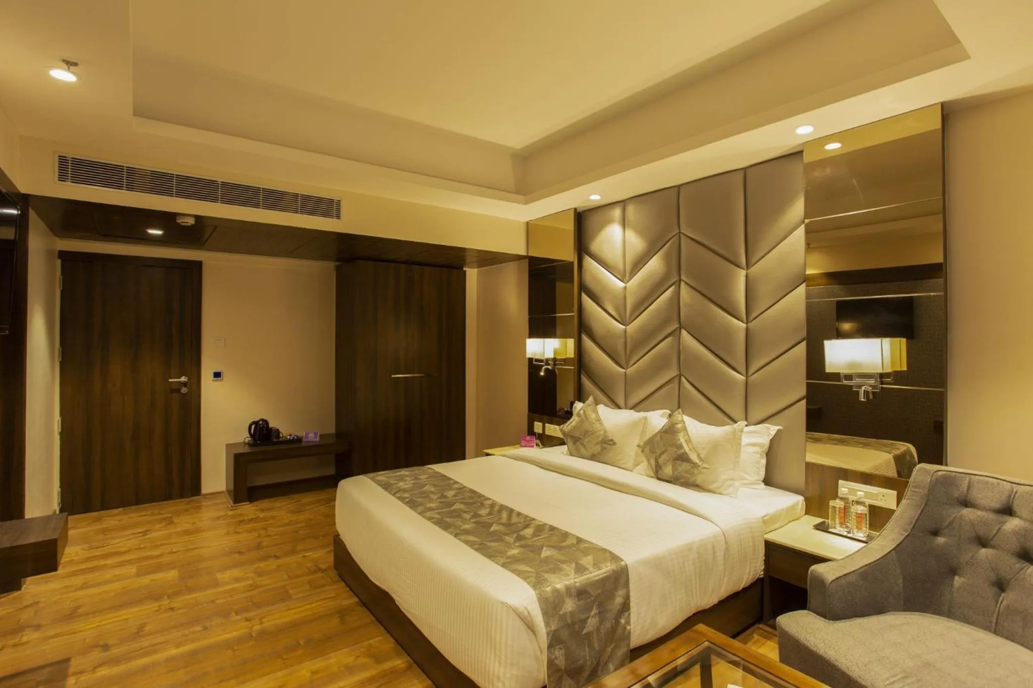 Photo of the whole room, Bed in Sarovar Portico, Somnath
