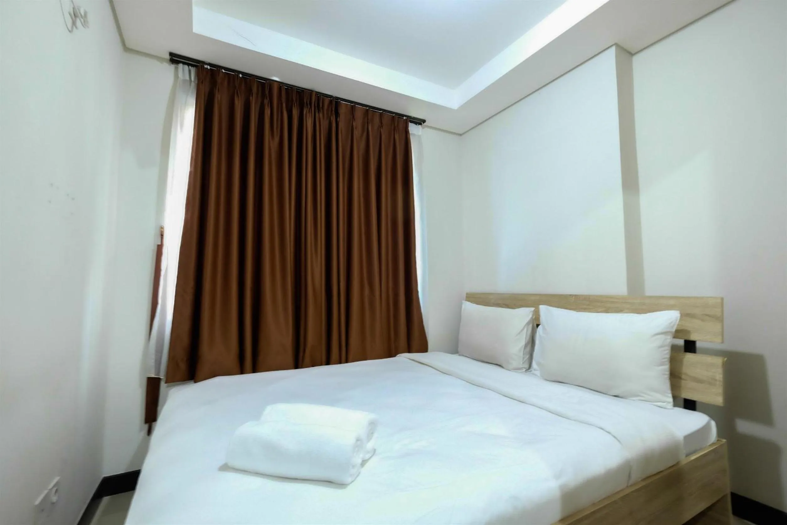 1BR Sky Terrace Lagoon Condo Apartment near Daan Mogot Mall By Travelio