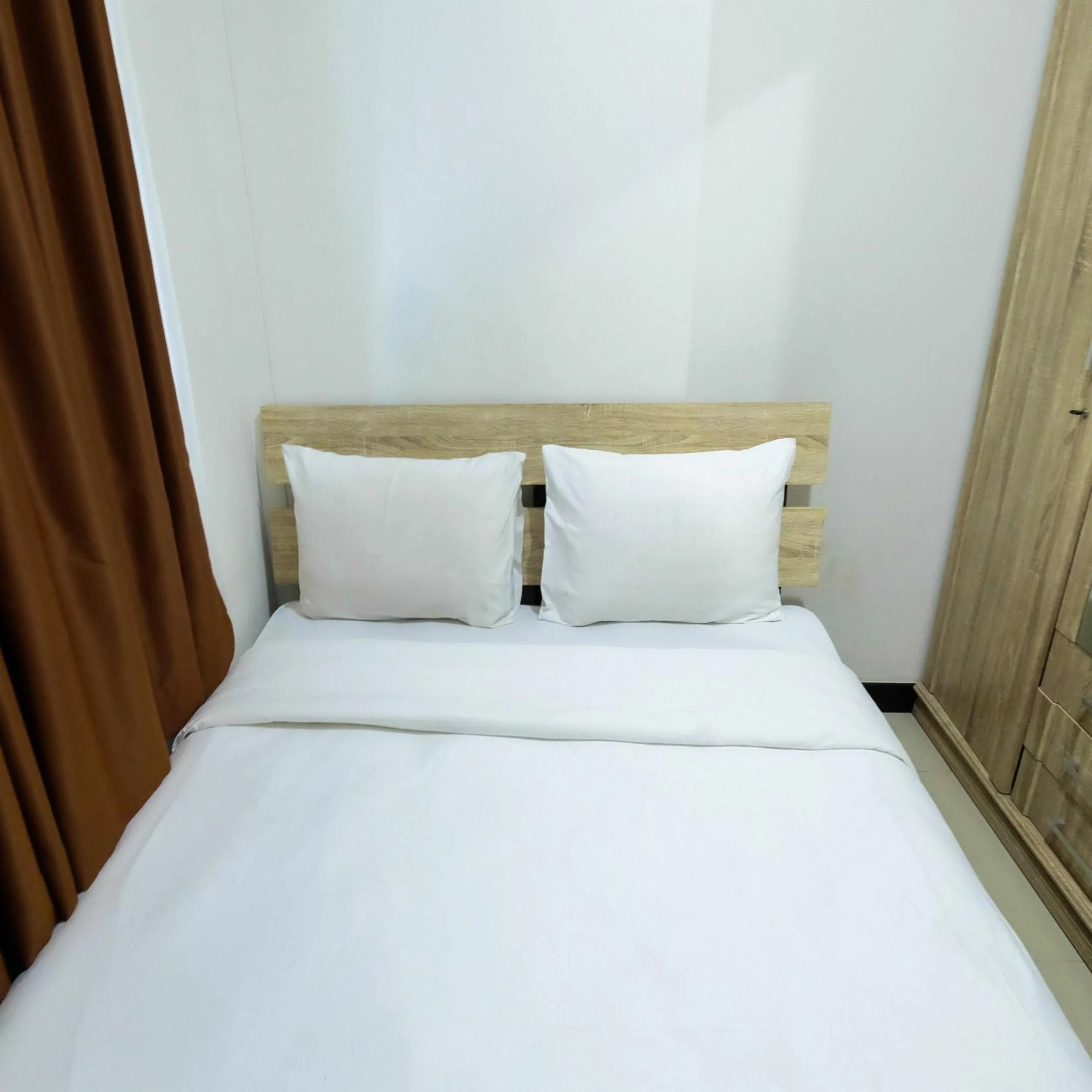 1BR Sky Terrace Lagoon Condo Apartment near Daan Mogot Mall By Travelio