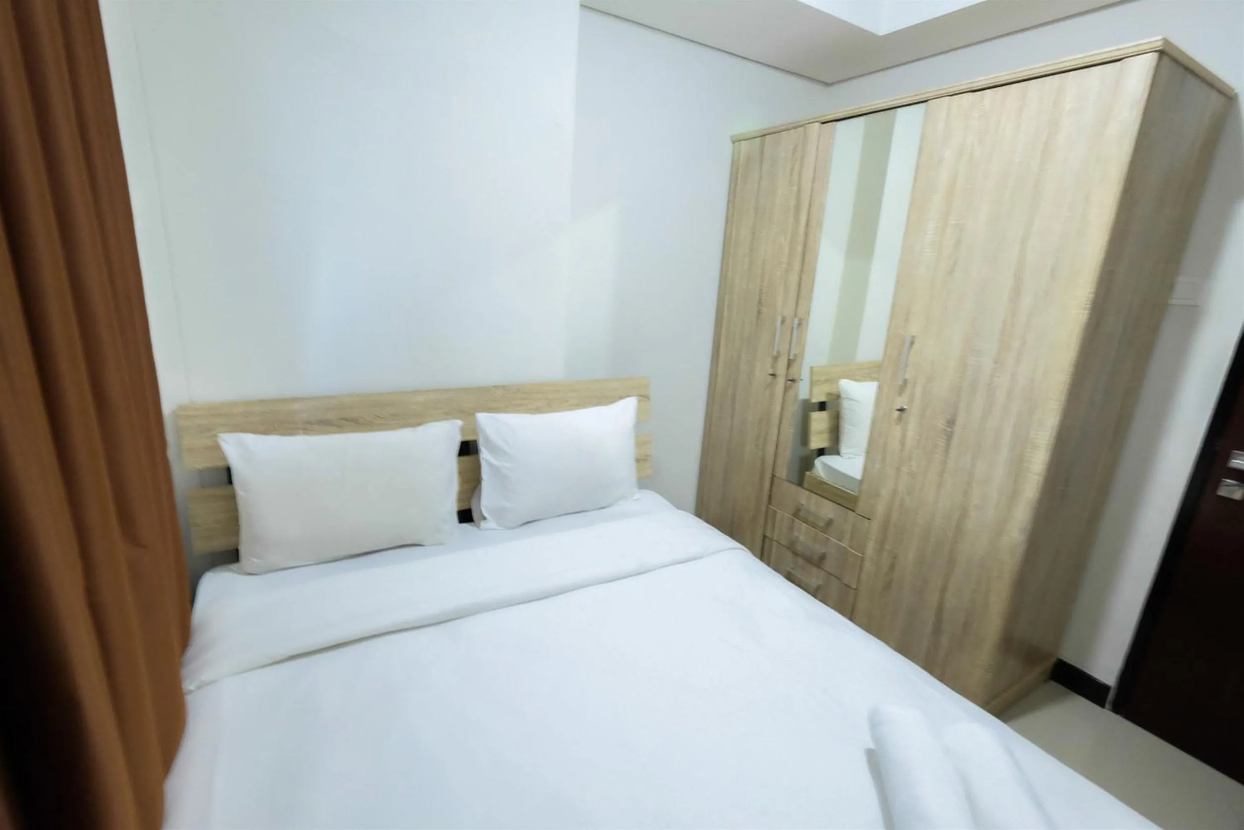 1BR Sky Terrace Lagoon Condo Apartment near Daan Mogot Mall By Travelio