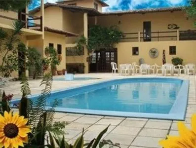 Swimming pool in Pousada Dos Girassois Prado