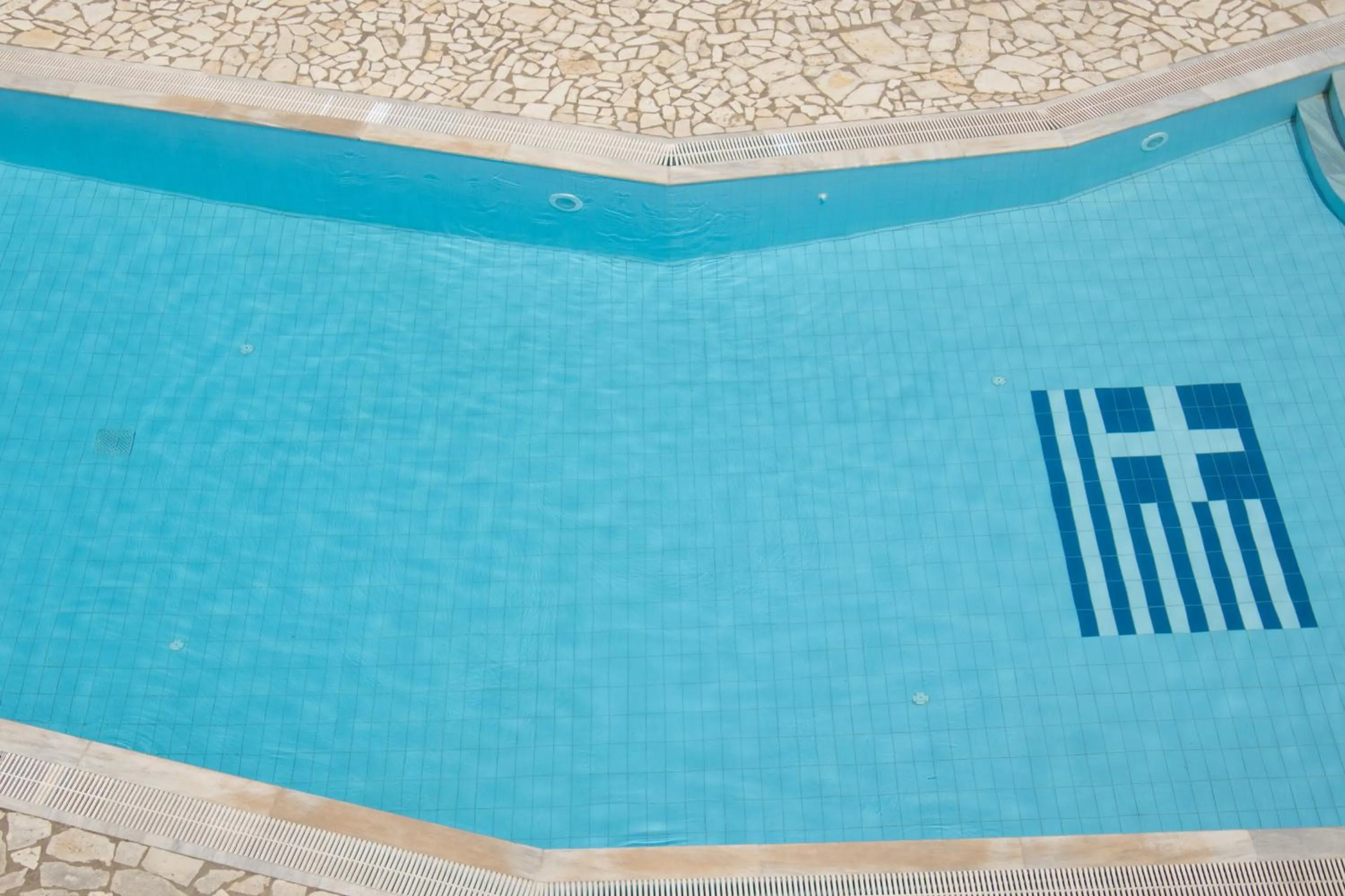 Pool view in APRAOS BAY HOTEL