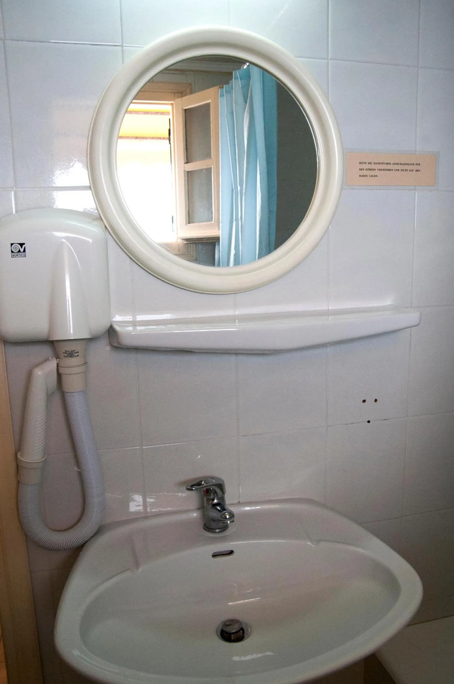 Toilet in APRAOS BAY HOTEL