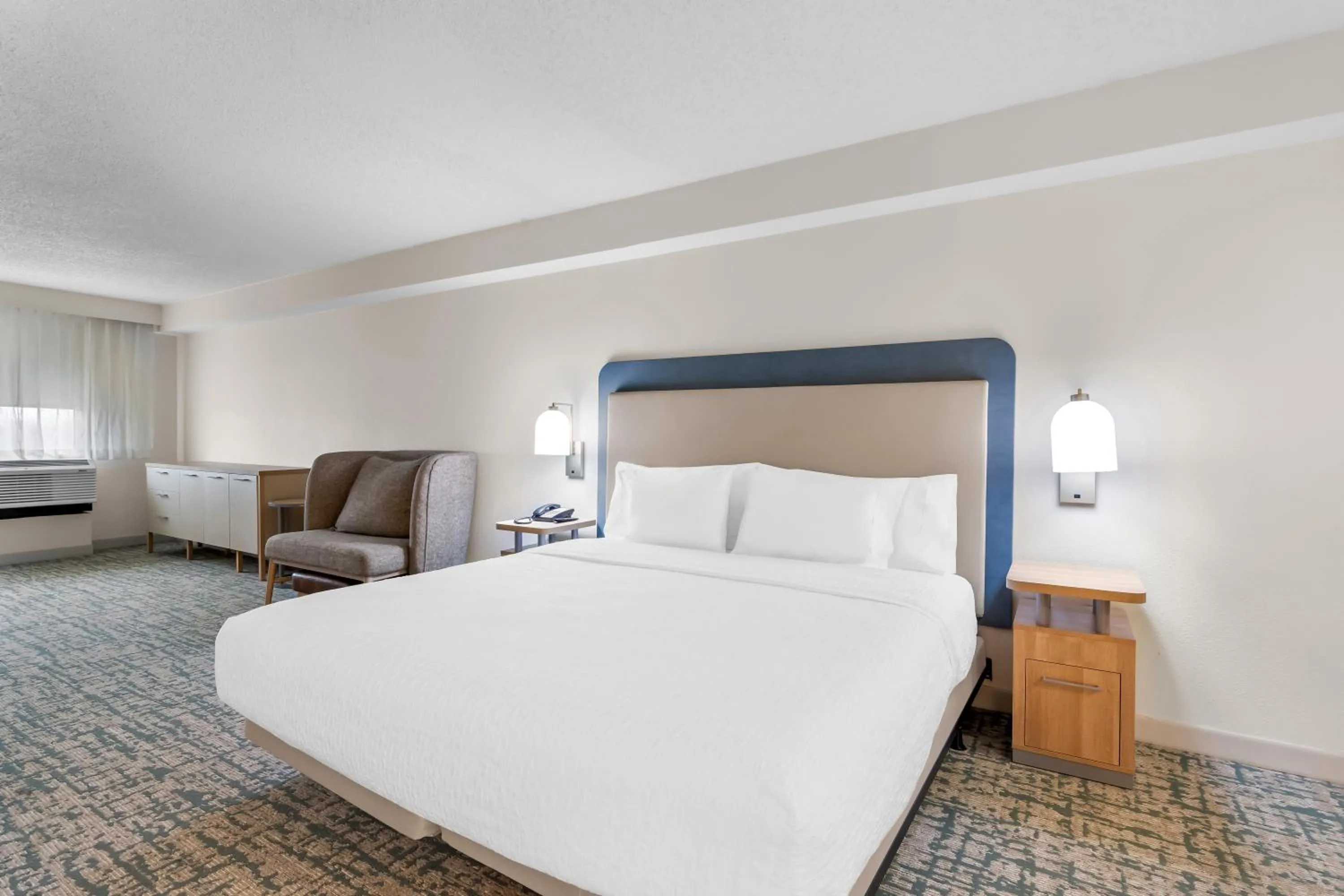 Bed in Homewood Suites by Hilton Oklahoma City Airport