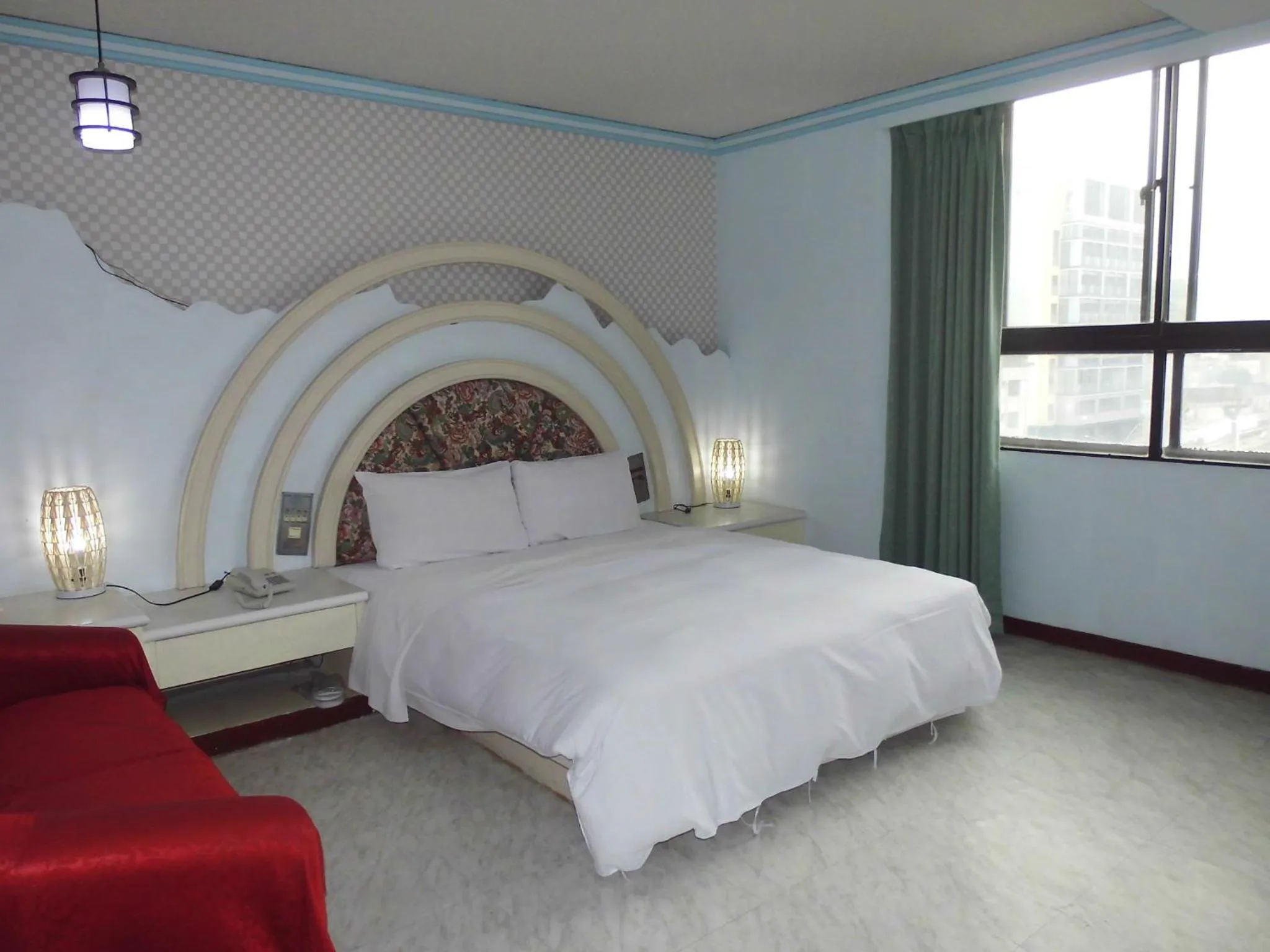 Bed in Modern Plaza Hotel