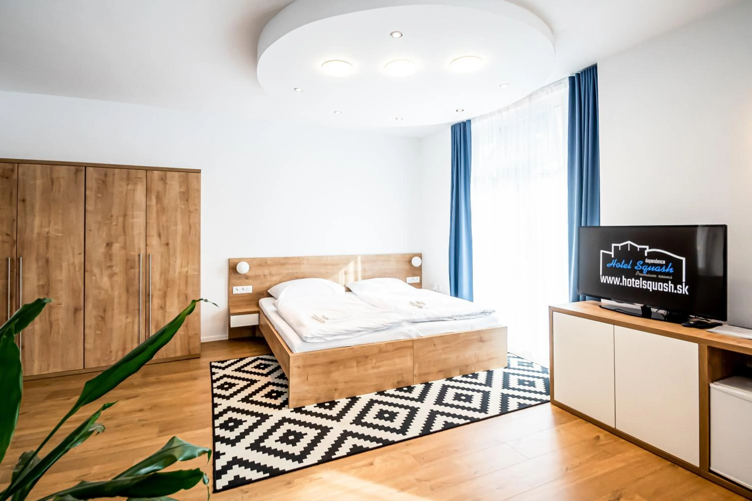 Bed in Hotel Squash Dependance