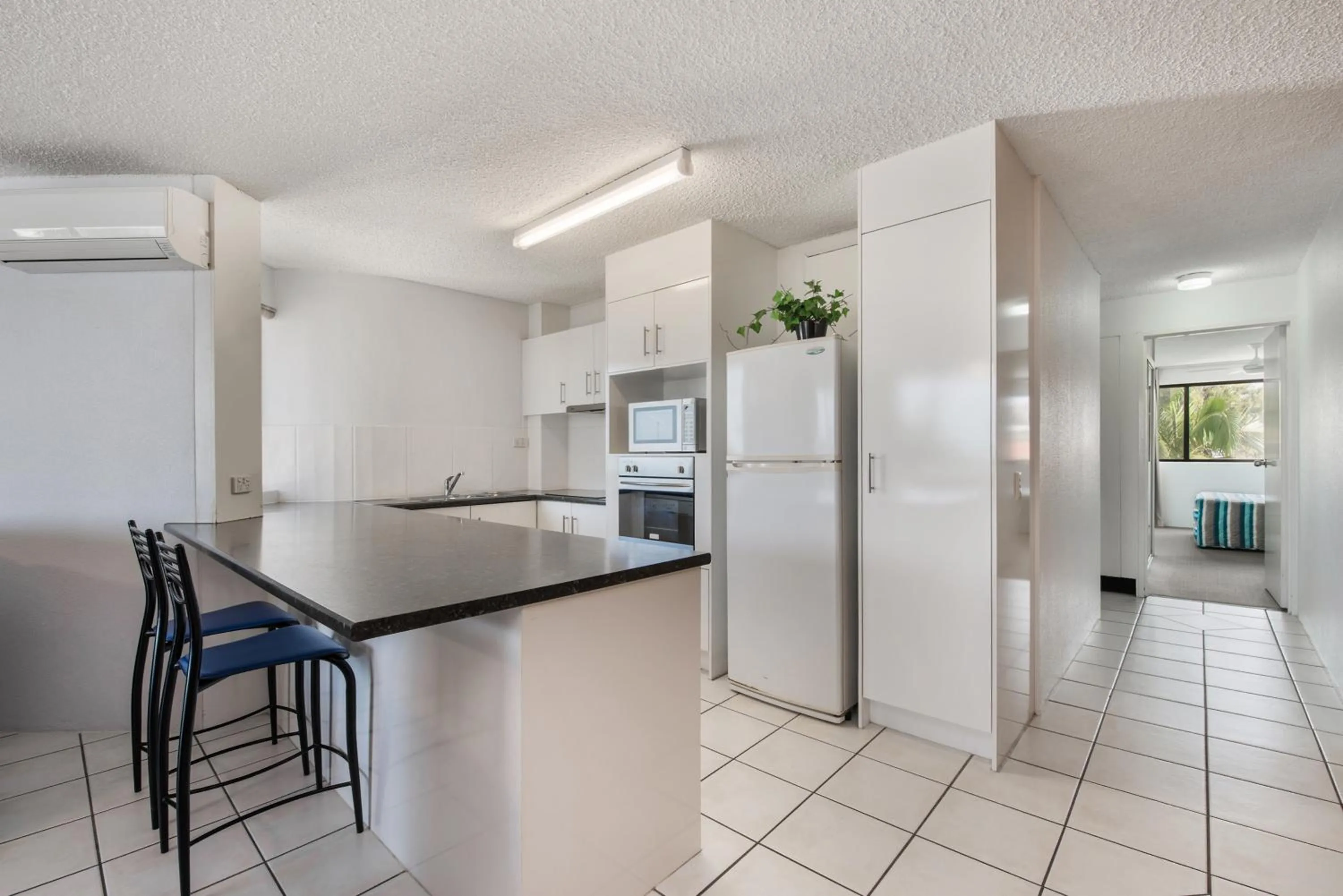 Kitchen or kitchenette in Alexandria Apartments