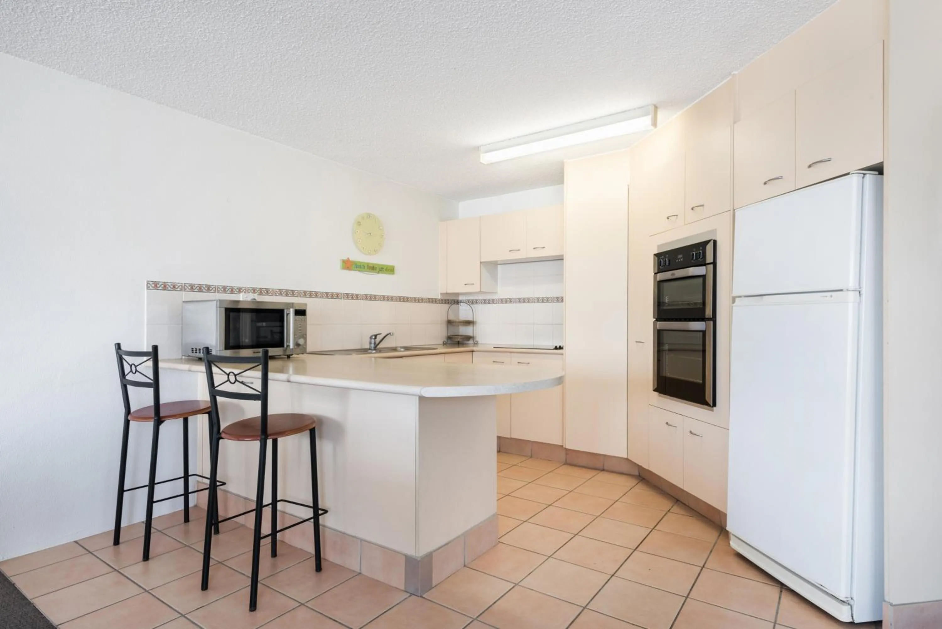 Kitchen or kitchenette in Alexandria Apartments