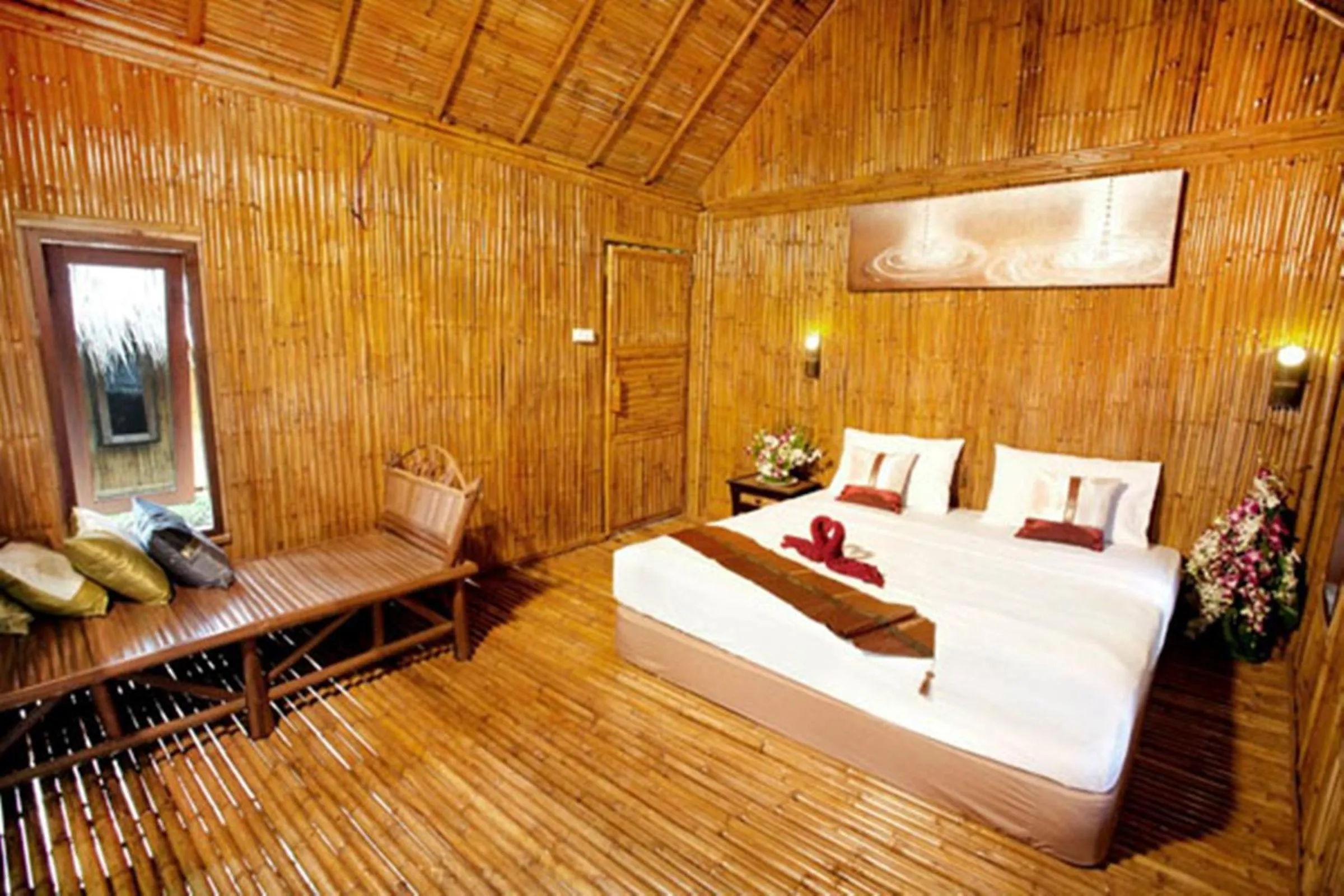 Photo of the whole room, Bed in The Cove Phi Phi