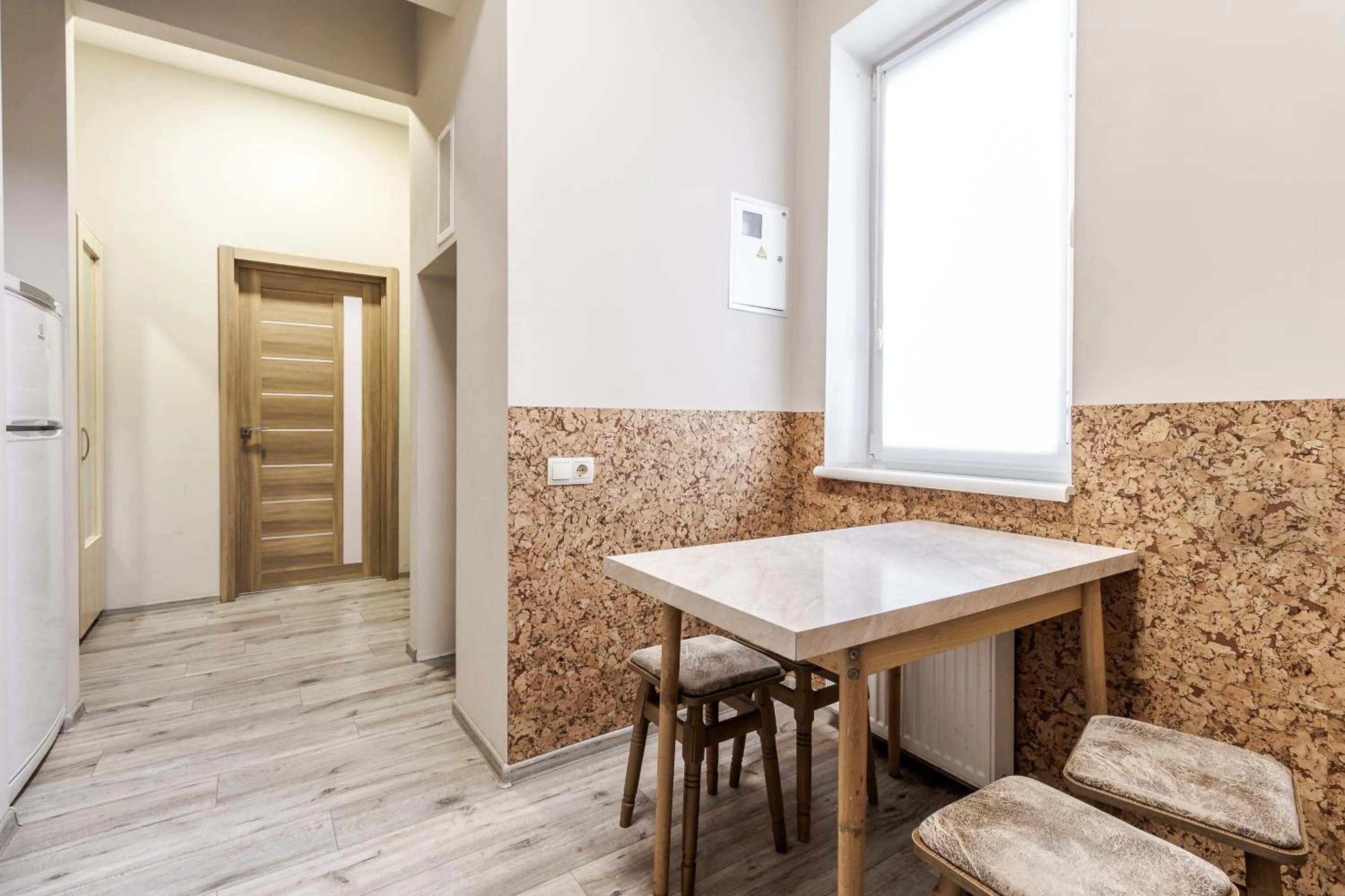 Dining area in Creamy apartment