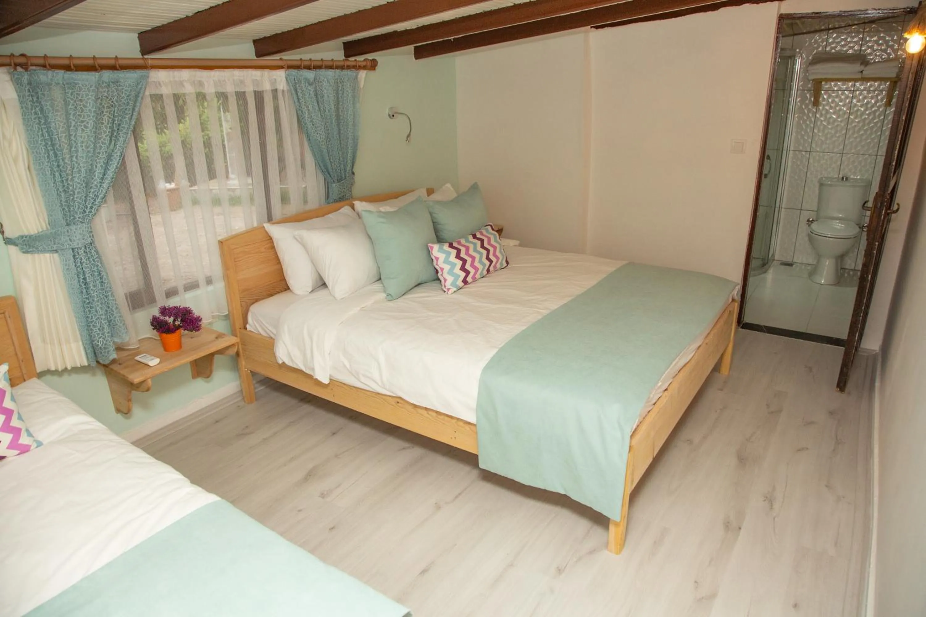 Bed in Kara Kedi Beach Bungalow