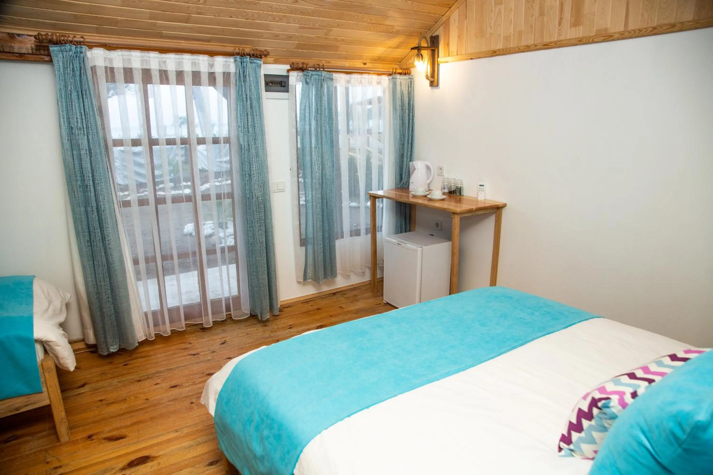 Bed in Kara Kedi Beach Bungalow