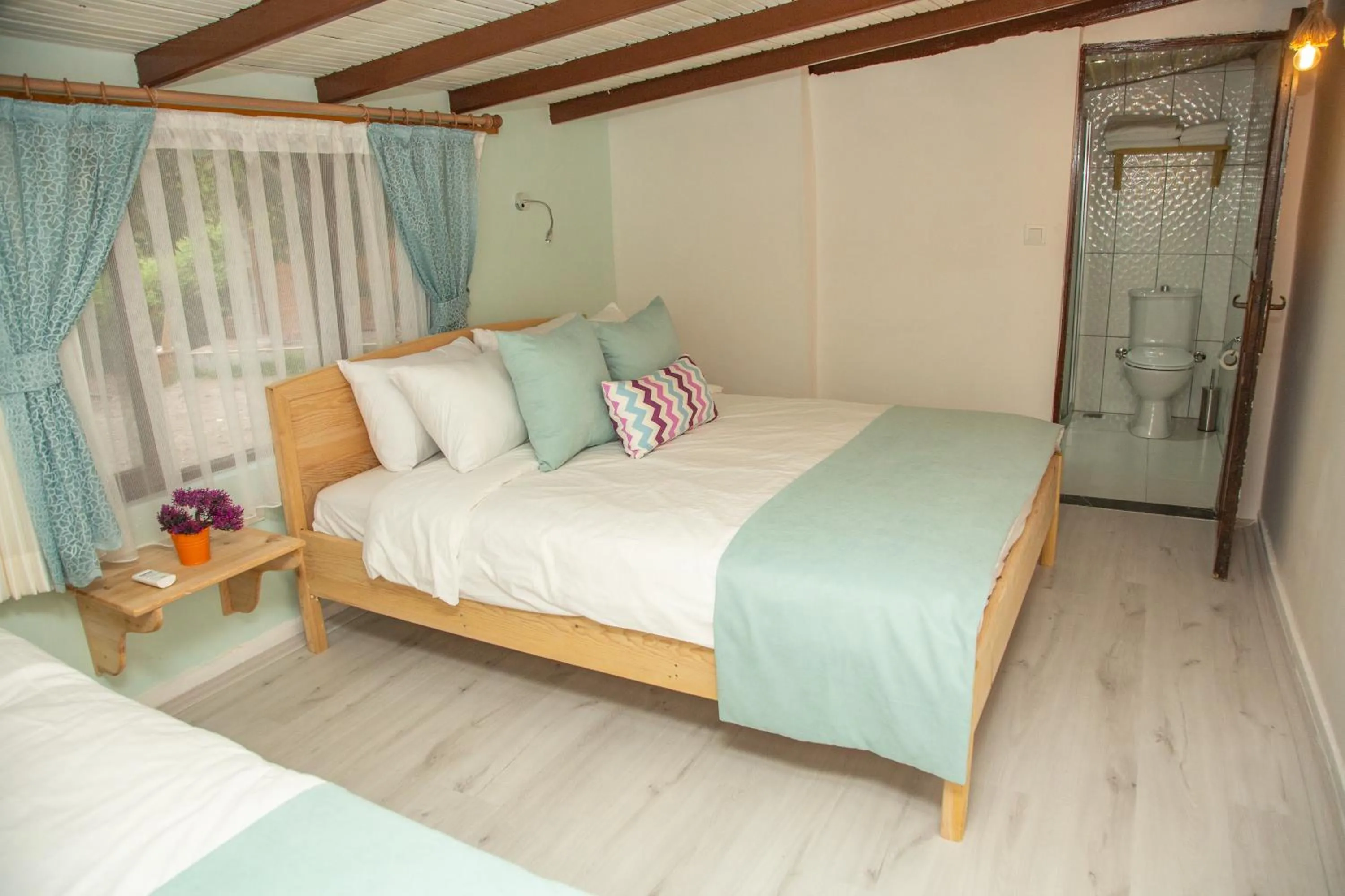Bed in Kara Kedi Beach Bungalow