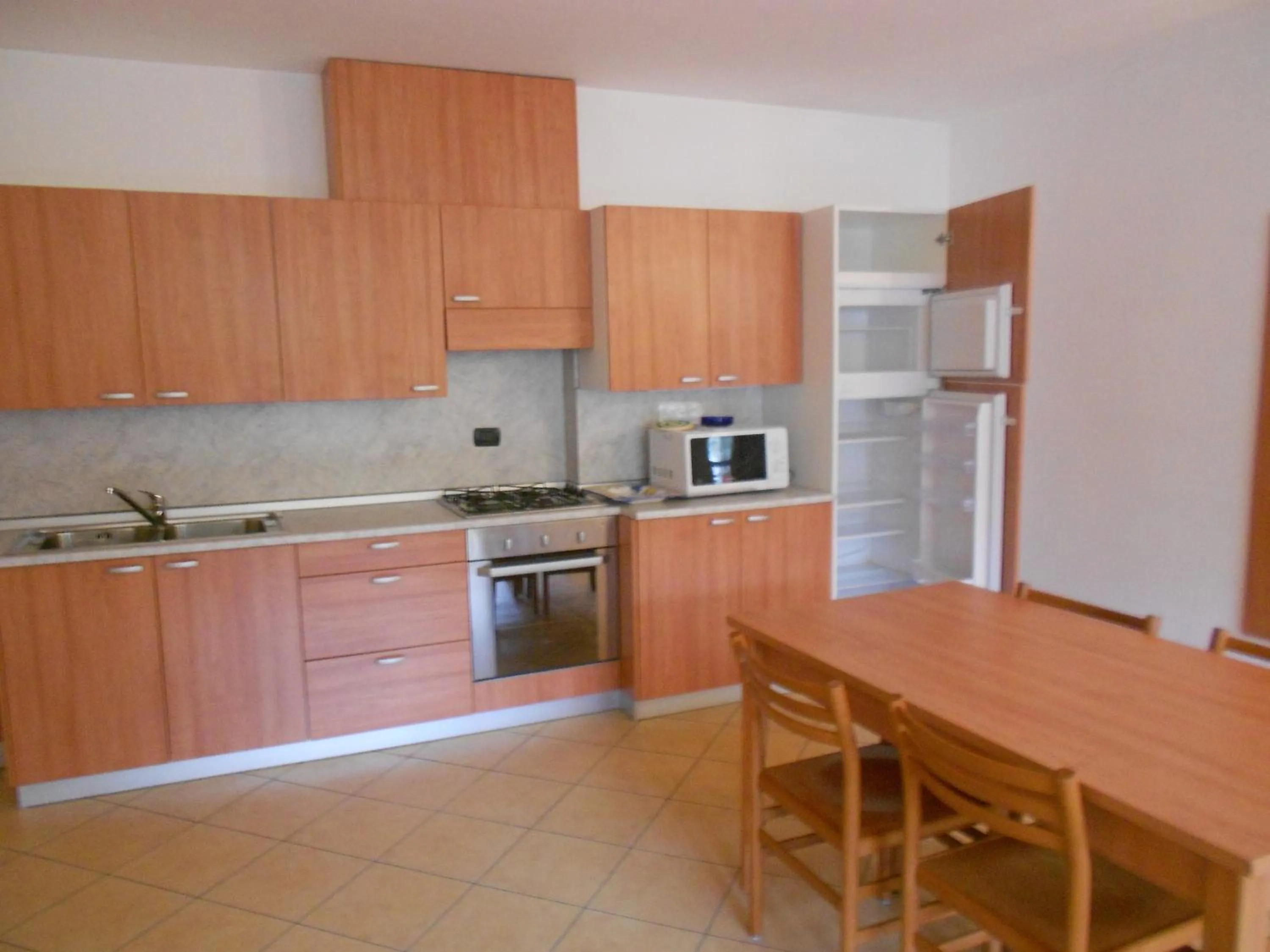 Kitchen or kitchenette in Residence Le Orchidee