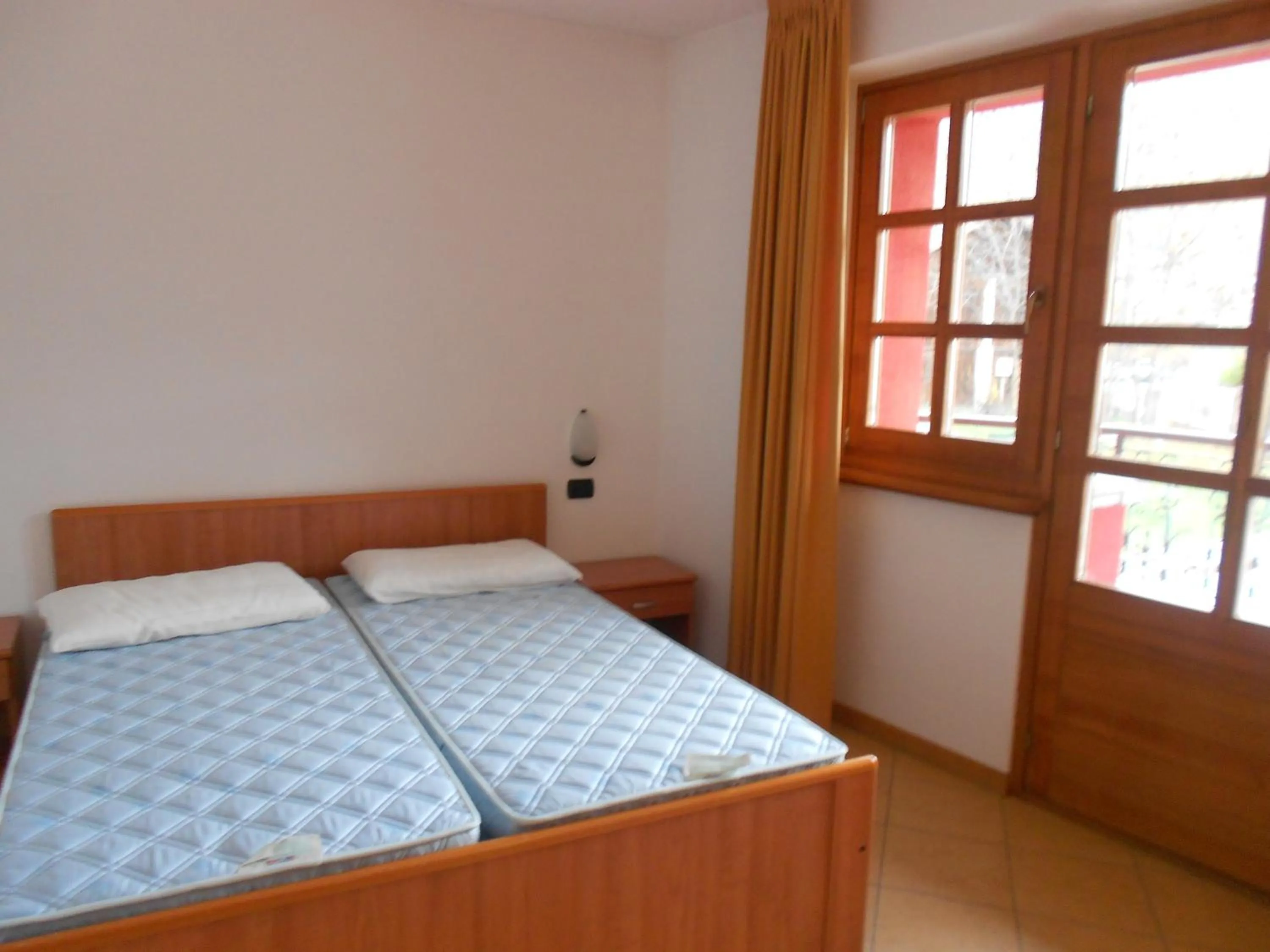 Bed in Residence Le Orchidee