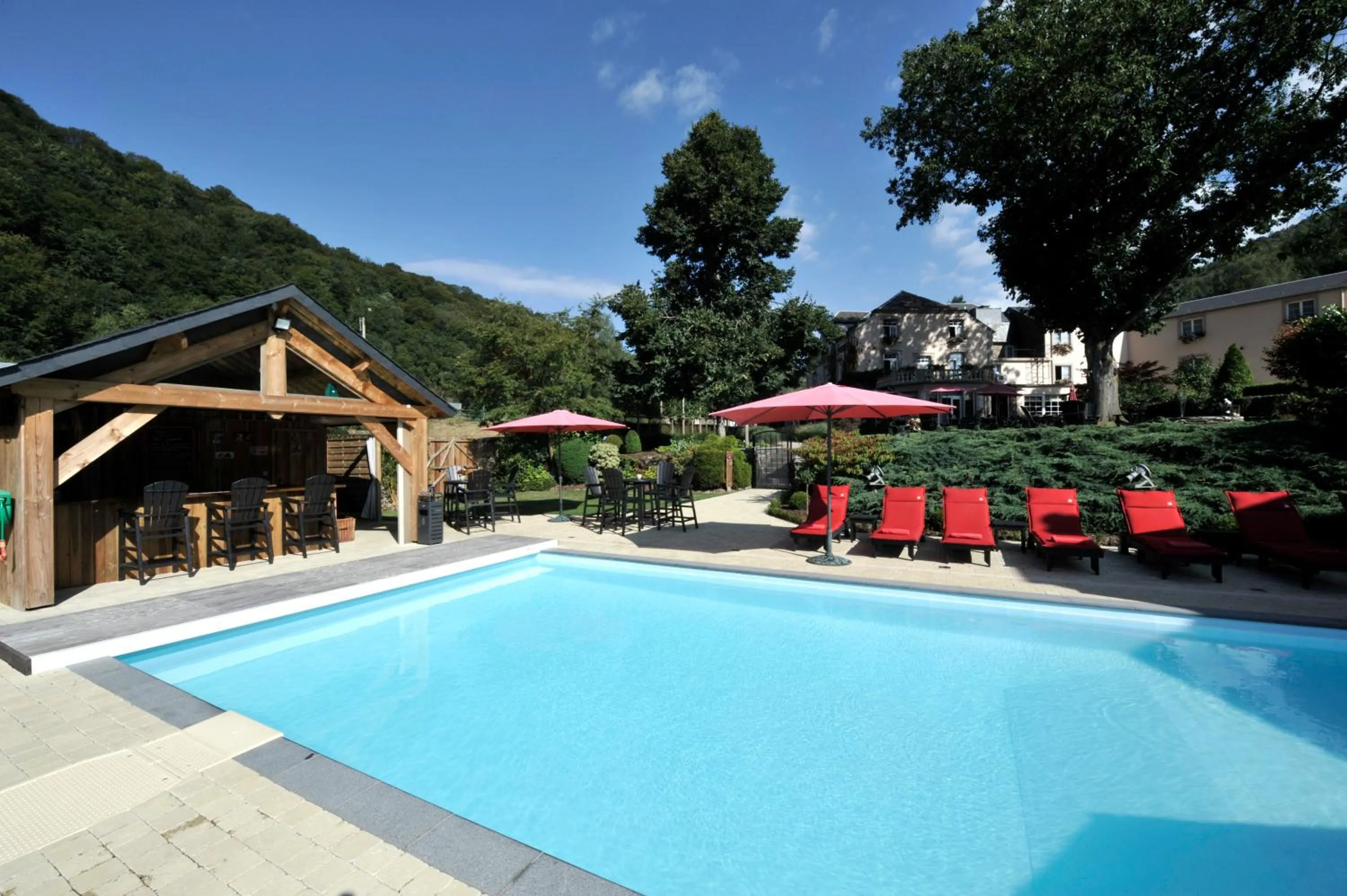 Swimming pool in Hotel Le Charme de la Semois