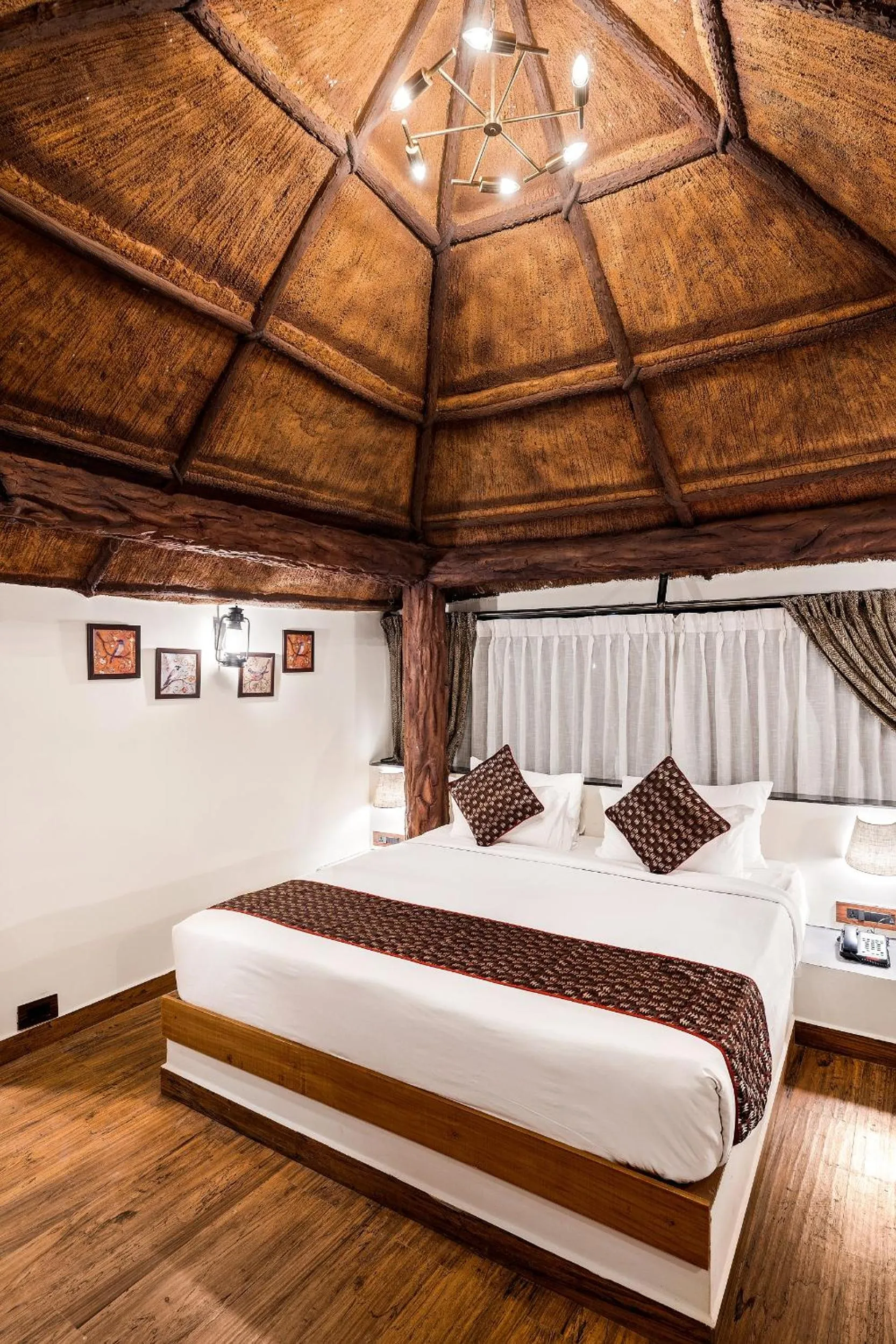 Bed in Vijayshree Resort, Hampi