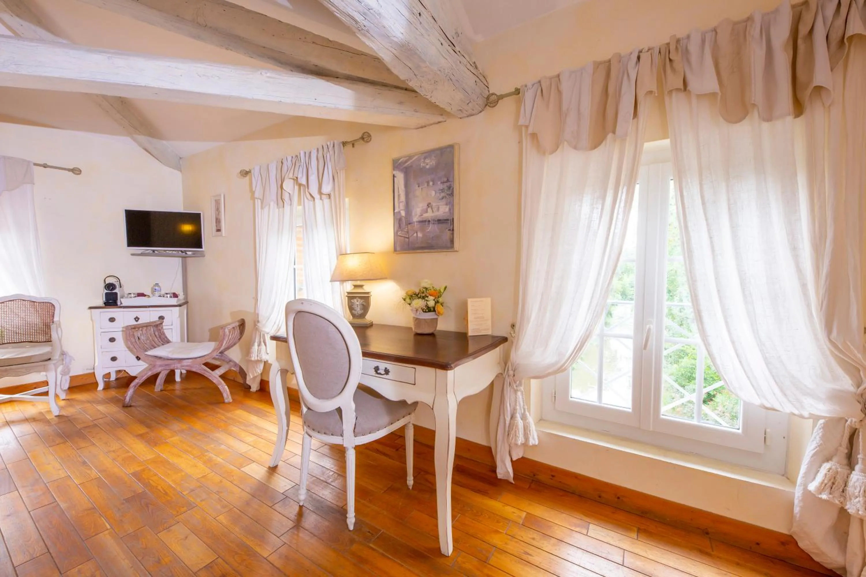 Seating area in Le Moulin de Rudelle