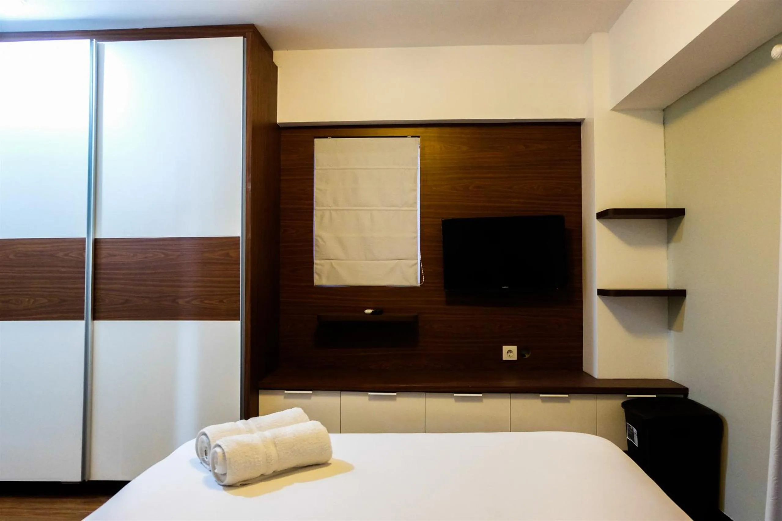 Bed in Amazing 2BR with City View The Wave Kuningan Apartment By Travelio