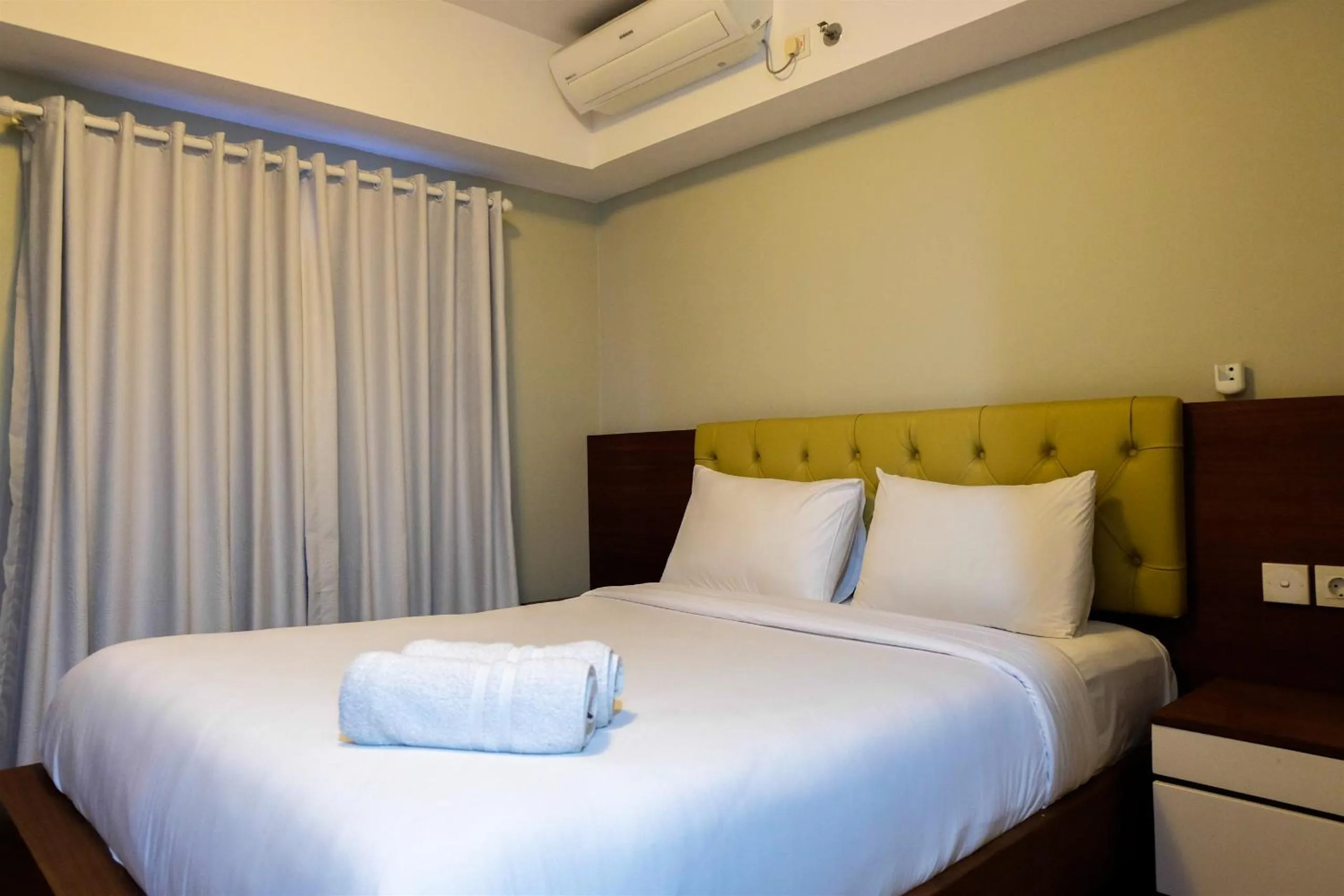 Bedroom, Bed in Amazing 2BR with City View The Wave Kuningan Apartment By Travelio