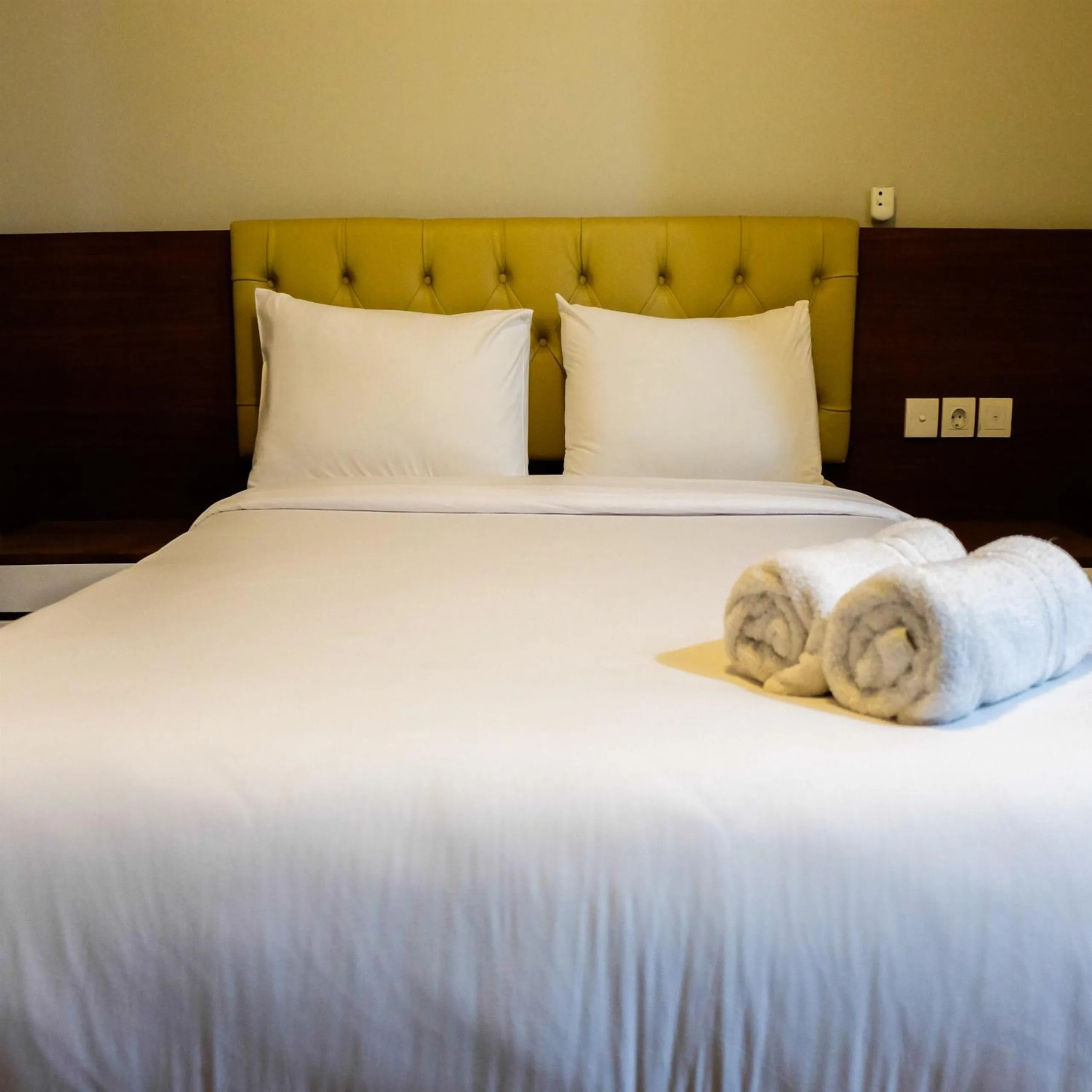 Bed in Amazing 2BR with City View The Wave Kuningan Apartment By Travelio