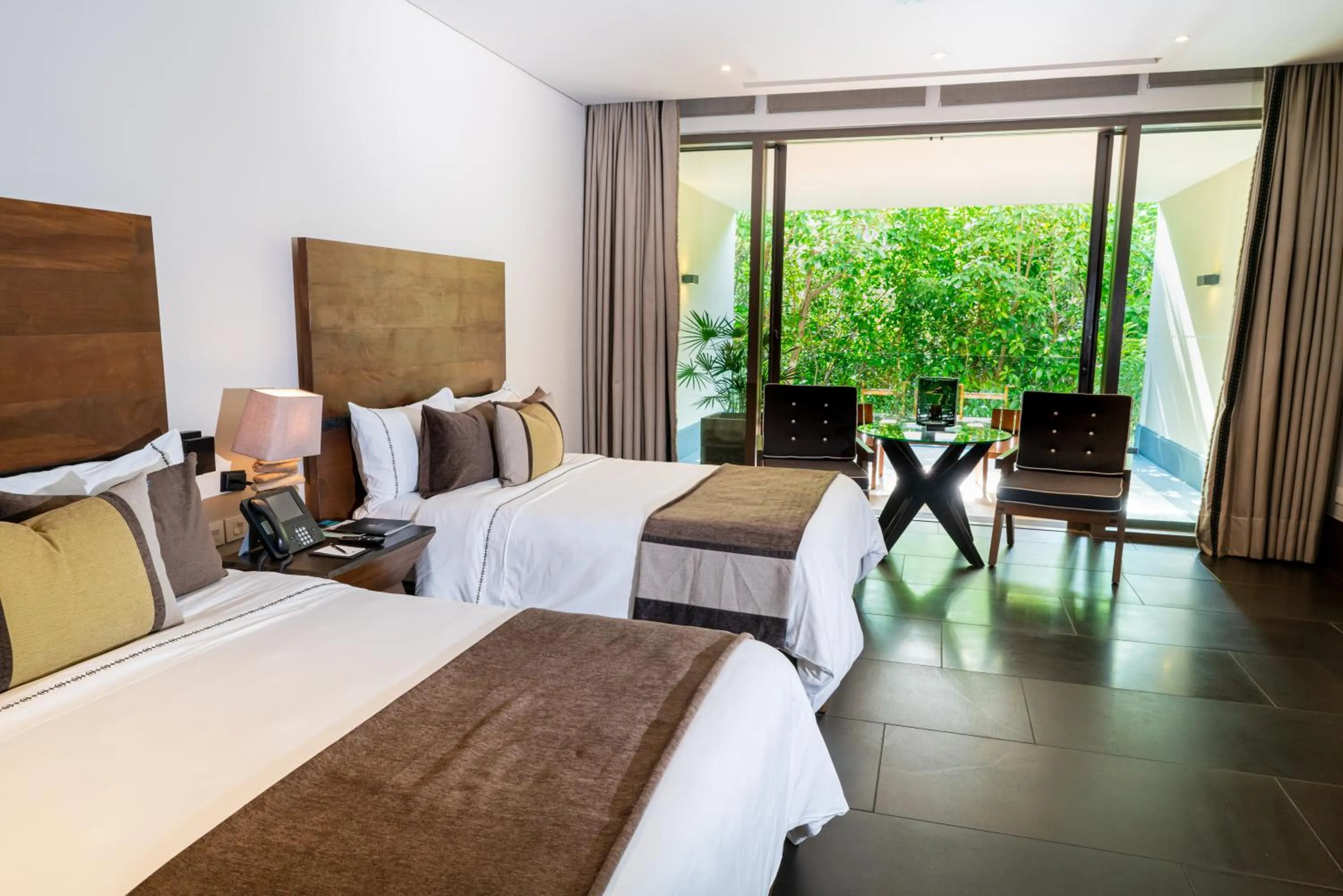 Bed in NIZUC Resort & Spa