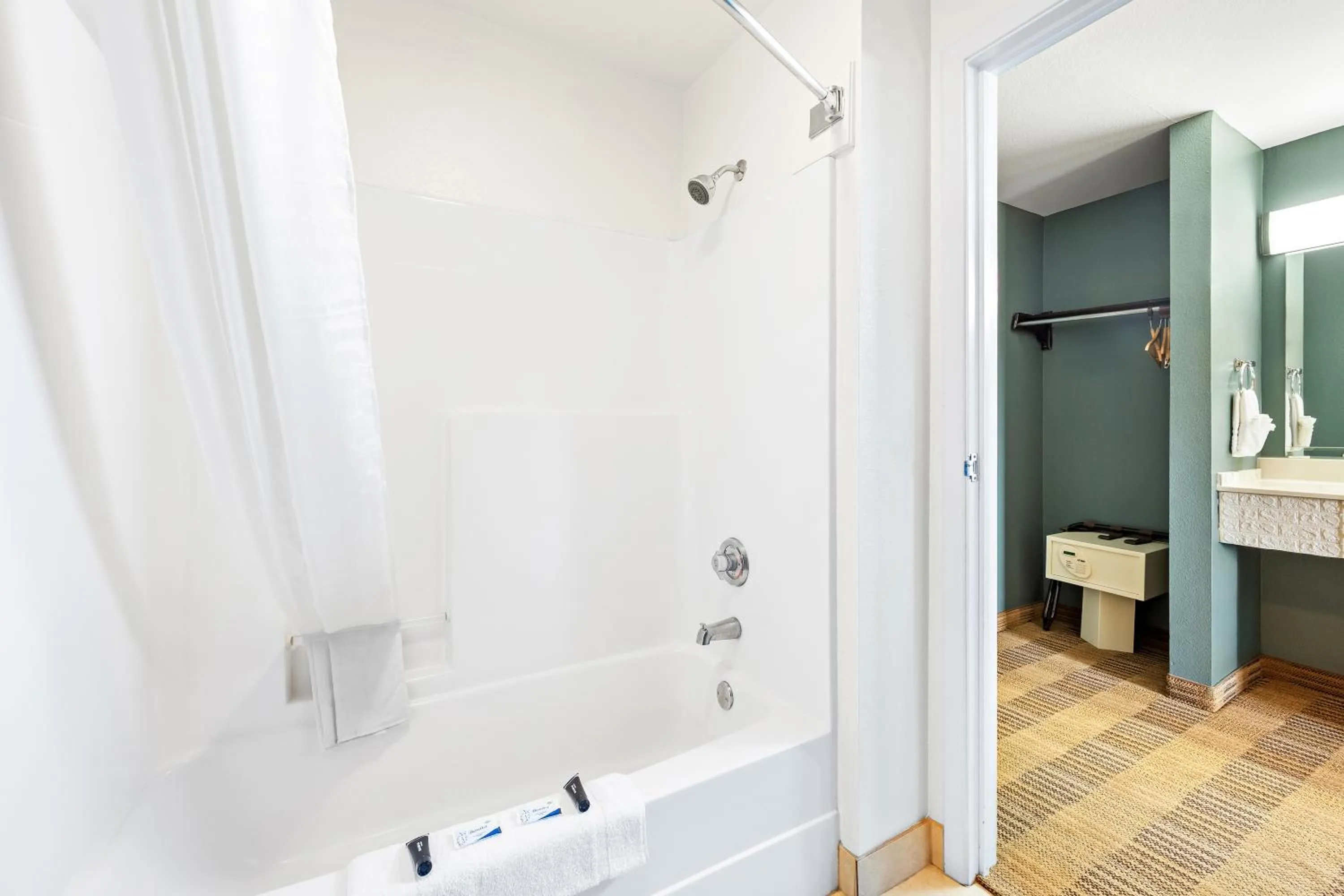 Shower in Americas Best Value Inn Somerville Texas