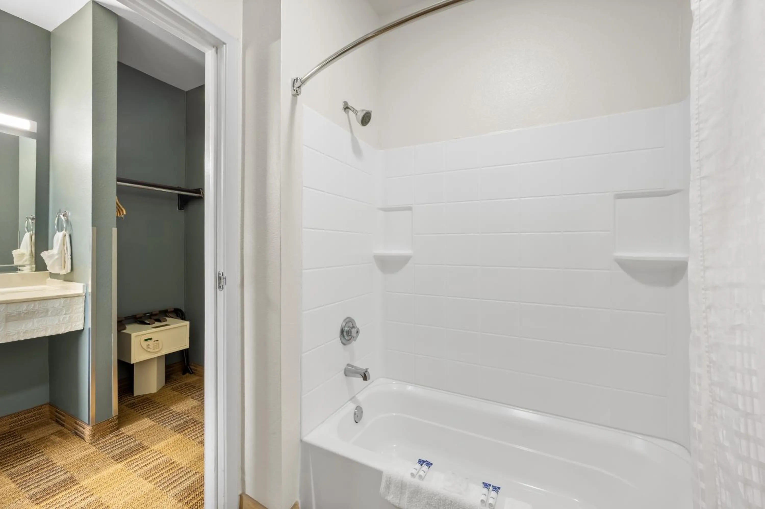 Shower in Americas Best Value Inn Somerville Texas